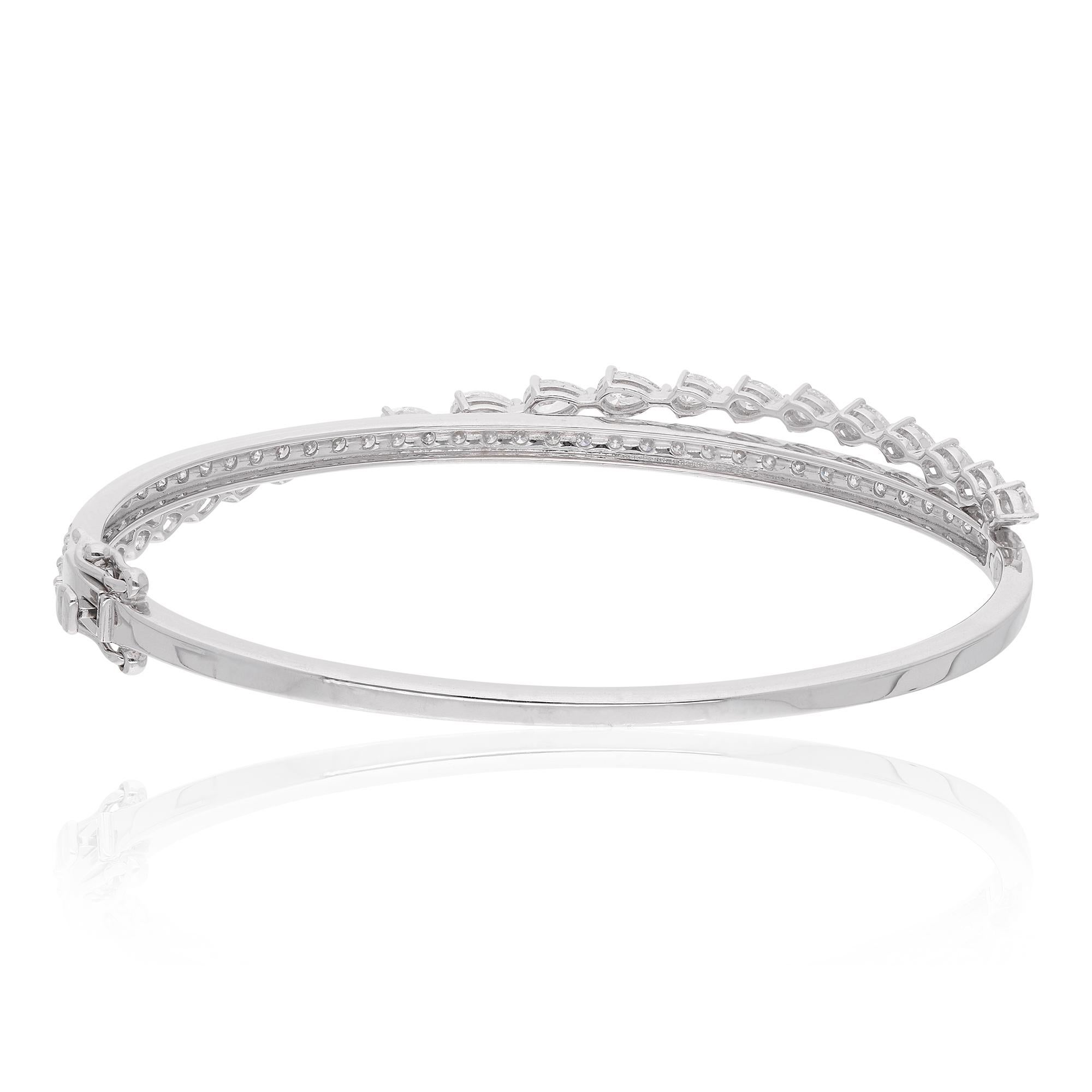 18k Diamond White Gold Bracelet / Round & Pear Cut Diamond Bangle / Pave Diamond Wedding Bracelet / Bangle Bracelet / Valentine's Day Gift

This dainty diamond bracelet is a promise of perfection and purity. Gift this little piece of happiness to