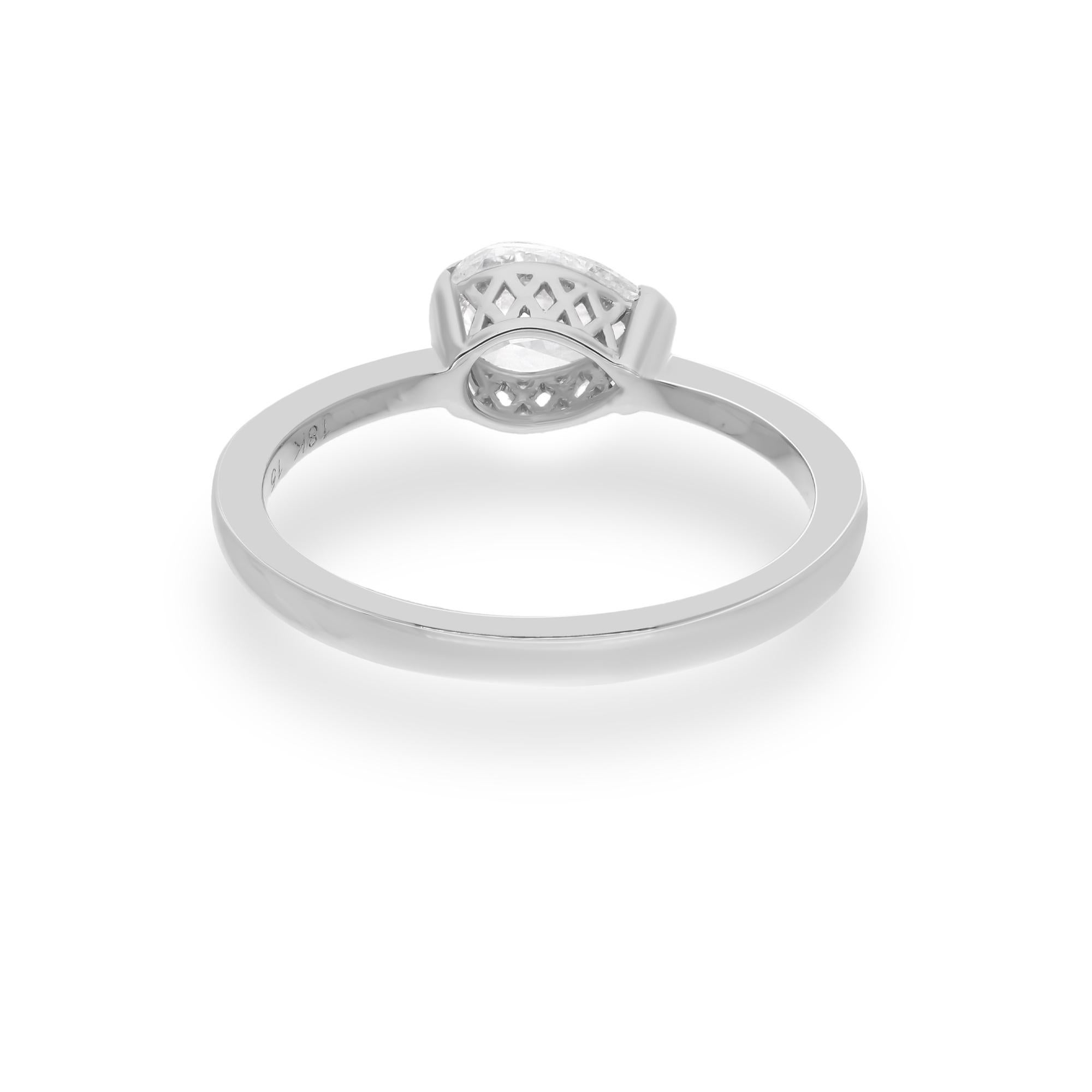 Immerse yourself in the unparalleled beauty and elegance of this exquisite SI Clarity HI Color Solitaire Pear Diamond Wedding Ring, meticulously crafted in luxurious 18 Karat White Gold. Designed to symbolize everlasting love and commitment, this