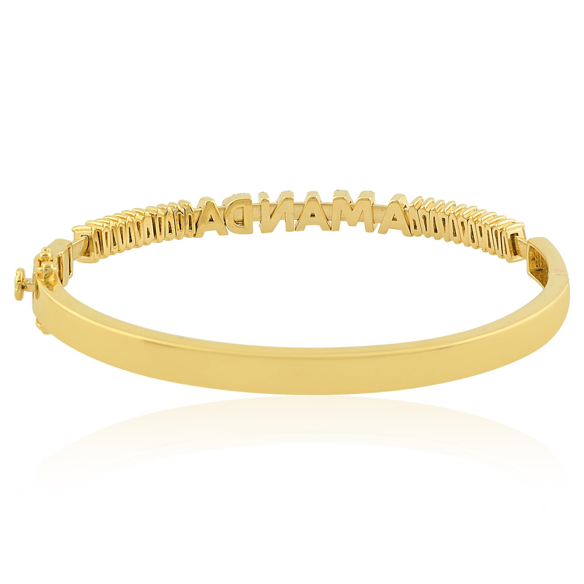 Indulge in the timeless elegance of this exquisite SI clarity, HI color tapered baguette diamond name bracelet crafted in 14 karat yellow gold. Each facet of this luxurious piece is meticulously designed to captivate the eye and adorn the wrist with