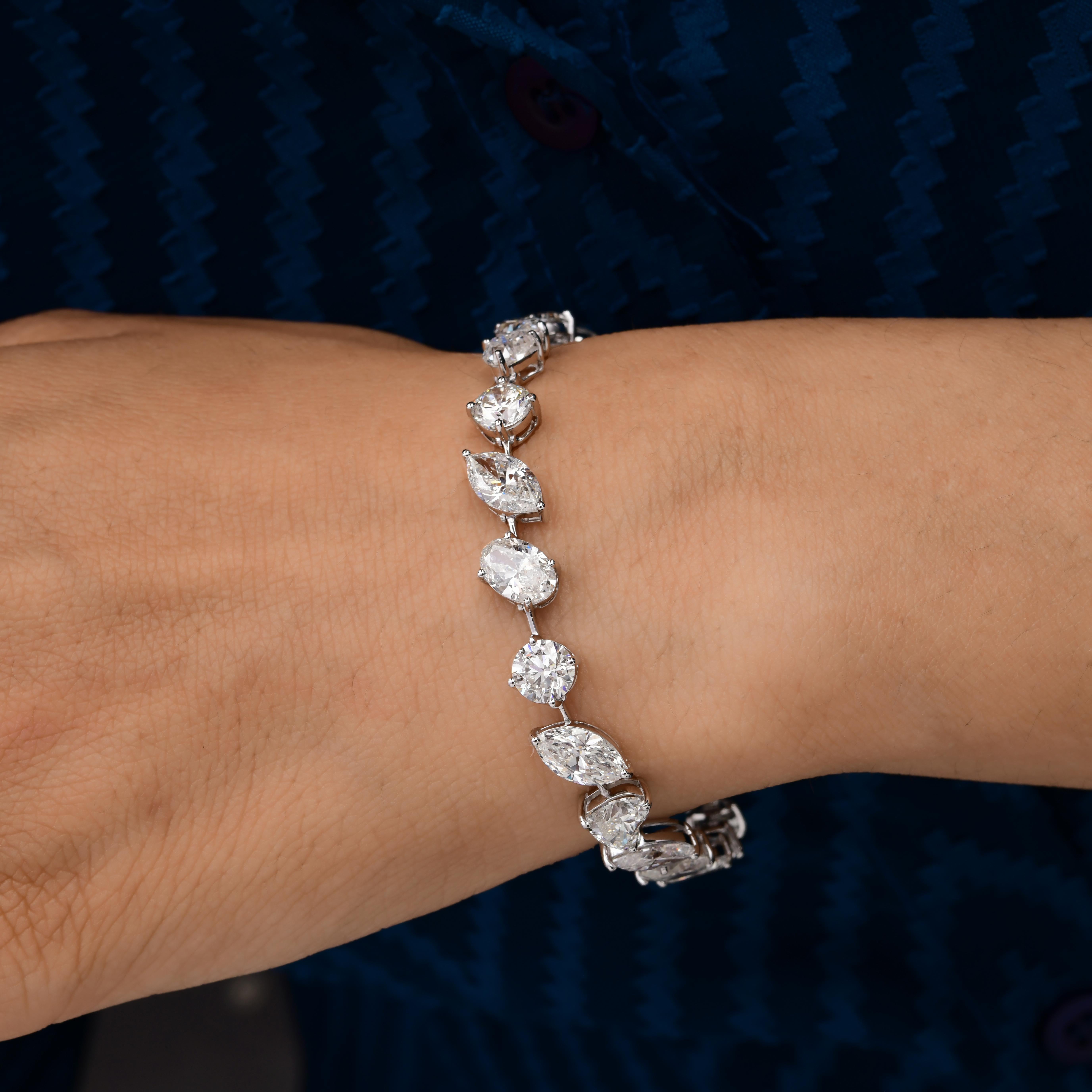 Cast from 18-karat gold, this exquisite bracelet is handset with 18.45 carats of sparkling diamonds. Diamond is a April birthstone and is believed to boost confidence and enhance creativity. A wonderful gift for Mom, Grandma, your wife, or daughter.