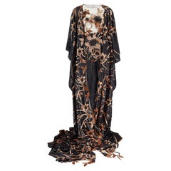 Siah Howard 
La Femme
 Black and Rose Gold Swimsuit and Cover-Up