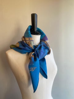 SIAM Blue silk scarf from Hermes. Designed by Vladimir Rybaltchenko in 1978
