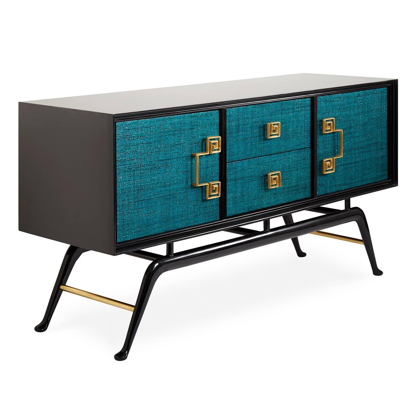 Revolutionary raffia. Inspired by JA's trip to Jim Thompson's legendary house in Bangkok, our Siam credenza captures the jewel-toned exoticism of old Siam. An ebonized mahogany base with brass accents supports a case faced with natural raffia, which