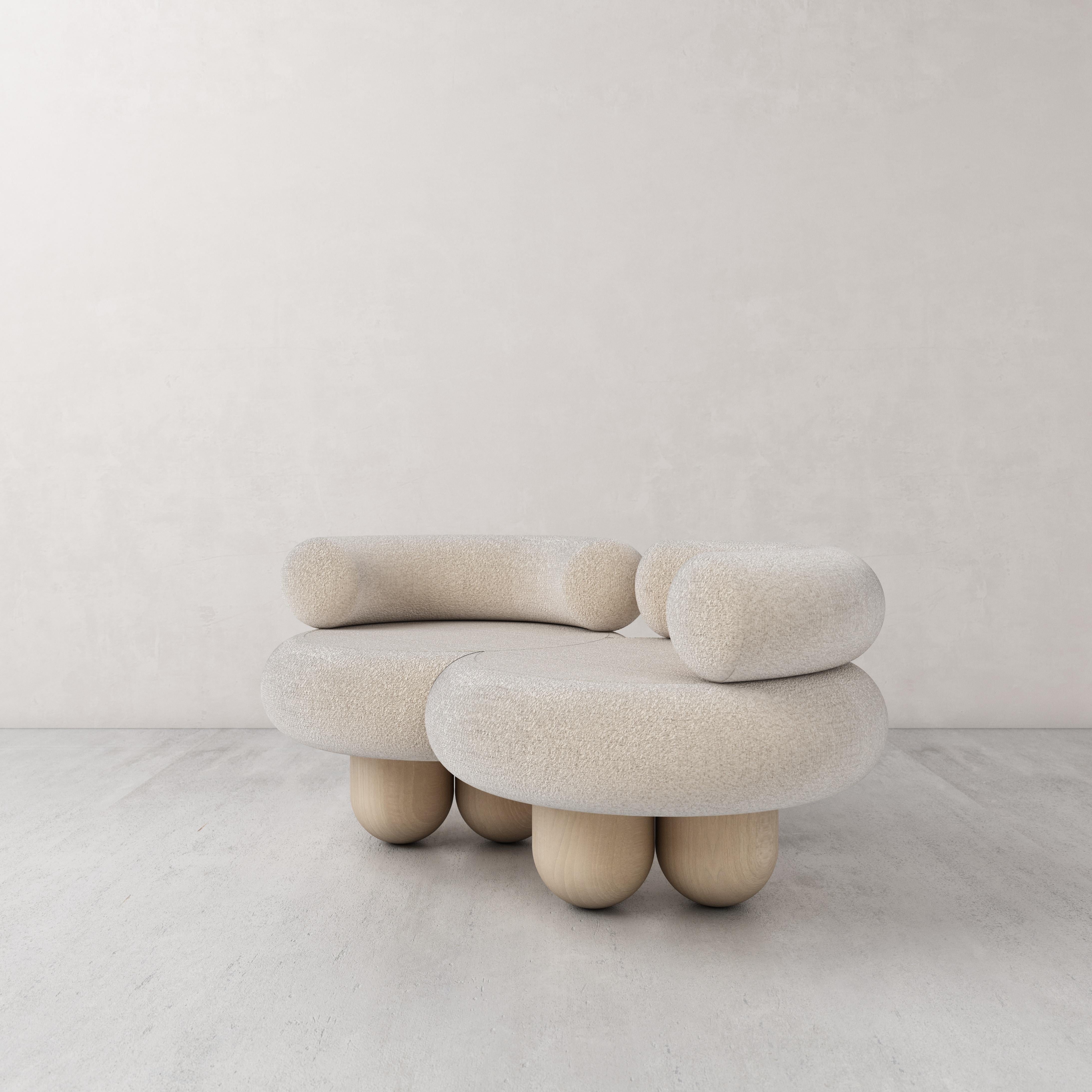 Siamese sofa by Pietro Franceschini
Sold exclusively by Galerie Philia
Manufacturer: Stefano Minotti
Dimensions: W 138 x L 83 x H 43-63cm
Materials: Lamb, ashwood
Also available in Bouclé.

Pietro Franceschini is an architect and designer
