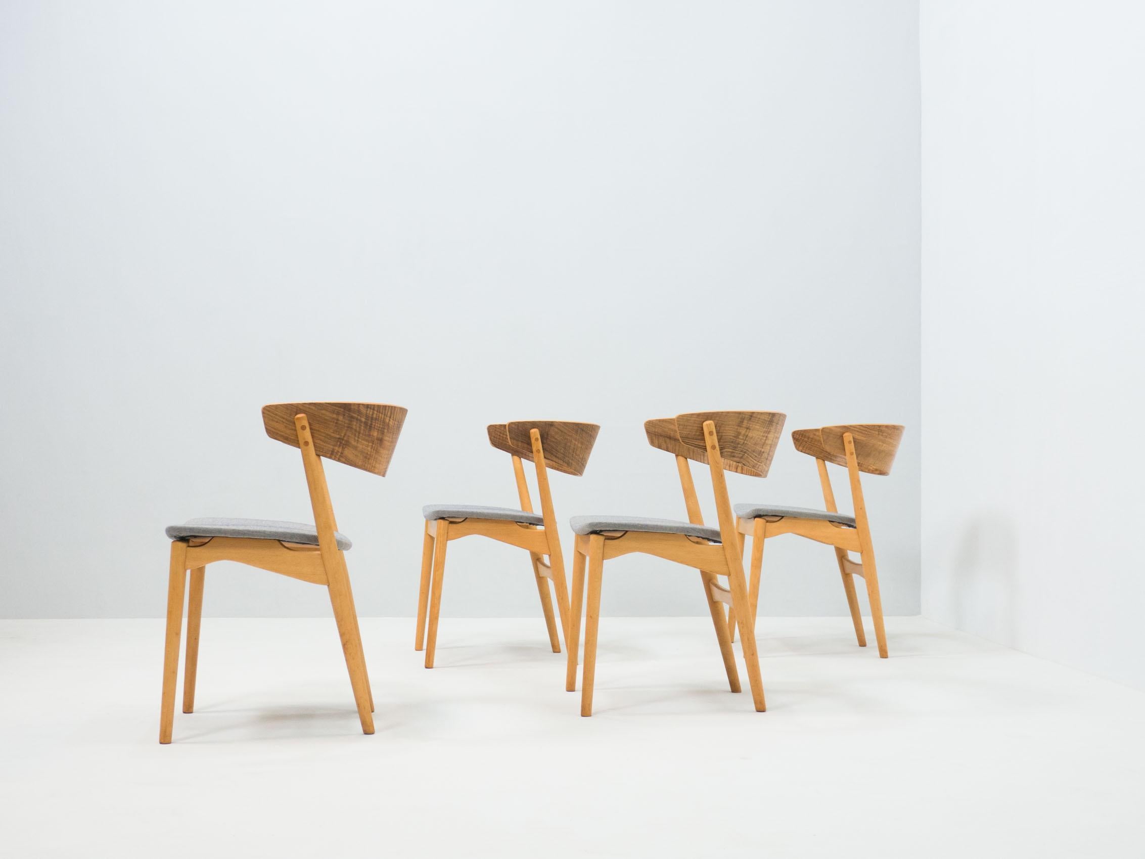 Set of four dining chairs designed by Helge Sibast, produced by Sibast Møbler, Denmark.

The chairs with model name ‘no. 7’ are made of a beech wood frame with walnut wood back rests.

All of the woodwork has been refinished. The seatings are