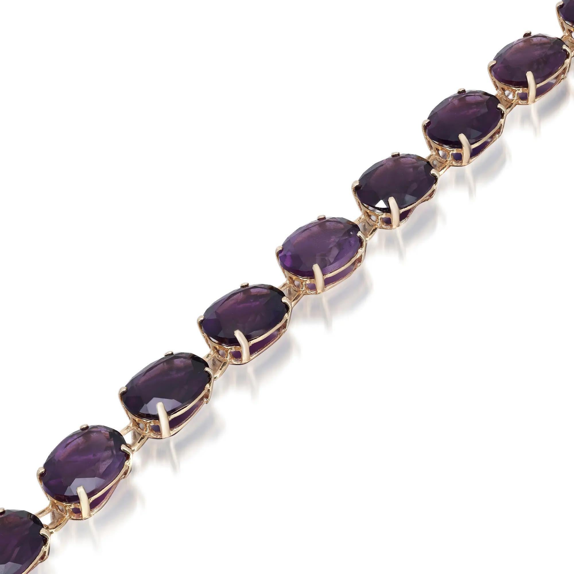 This vibrant colorful Siberian amethyst tennis bracelet is crafted in 14k yellow gold. Classic and chic, perfect stackable bracelet. Bracelet length: 7.5 inches. Width: 6.9mm. Total amethyst weight: 30 carats with each stone weighing approximately