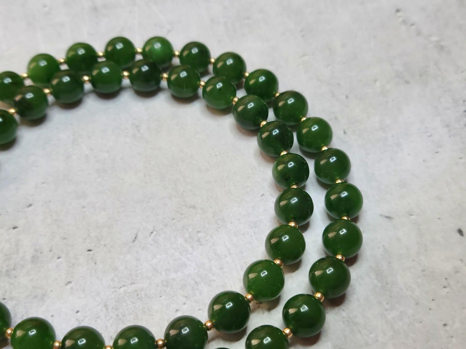 This beautiful, elegant, timeless necklace is made of high-quality natural Russian Siberian nephrite. The nephrite beads are top quality, uniform deep green, and they're sumptuous in how they look and feel. Authentic, natural color. No thermal or