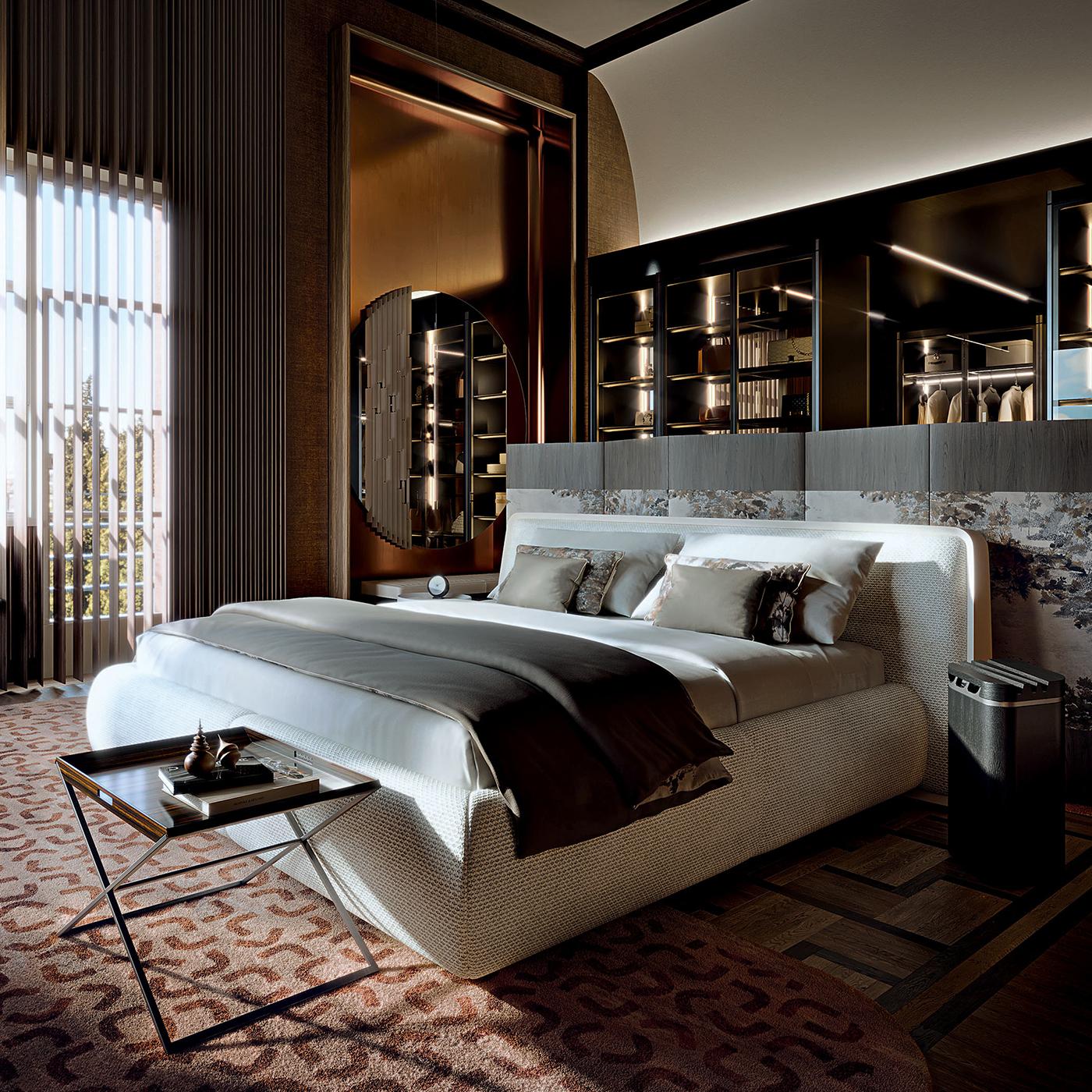 Sibilia is a compact anthracite grey ash totem designed to amplify the sound of tablets and mobile phones through strategically placed holes at the top. The design balances functionality and style, enhancing both audio performance and visual