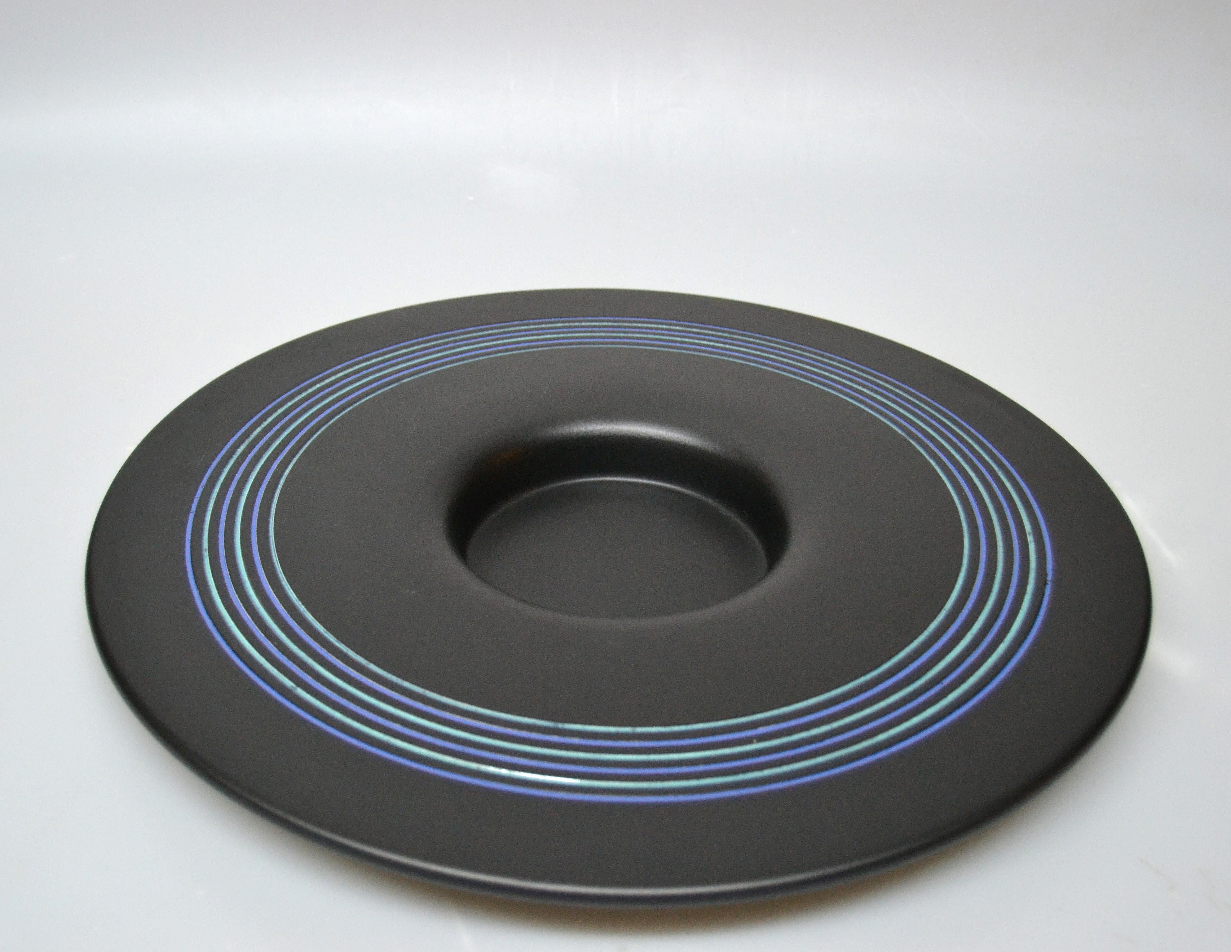Decorative glazed centerpiece, plate, fruit bowl in black with hues of blue designed by Boccato, Gigante, Zambusi, Architetti for Sicart, Italy.
Original label underneath, numbered 31, Italy.
Wonderfully crafted.
