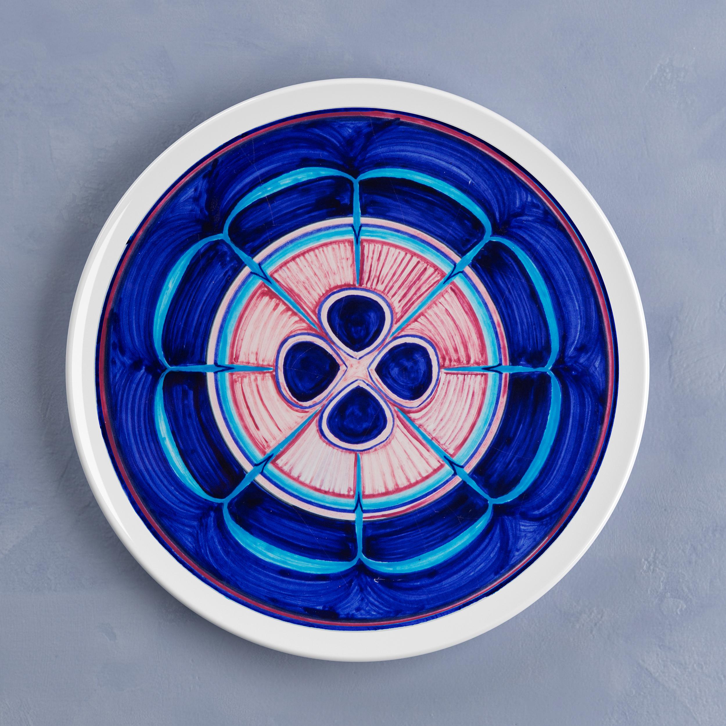Beautiful handcrafted dinner plate by Crisodora will make an elegant statement with sophisticated Art de la table for every occasion.

Sicilian clay, hand painted.

Made in Sicily (Italy) by Master Artisans.