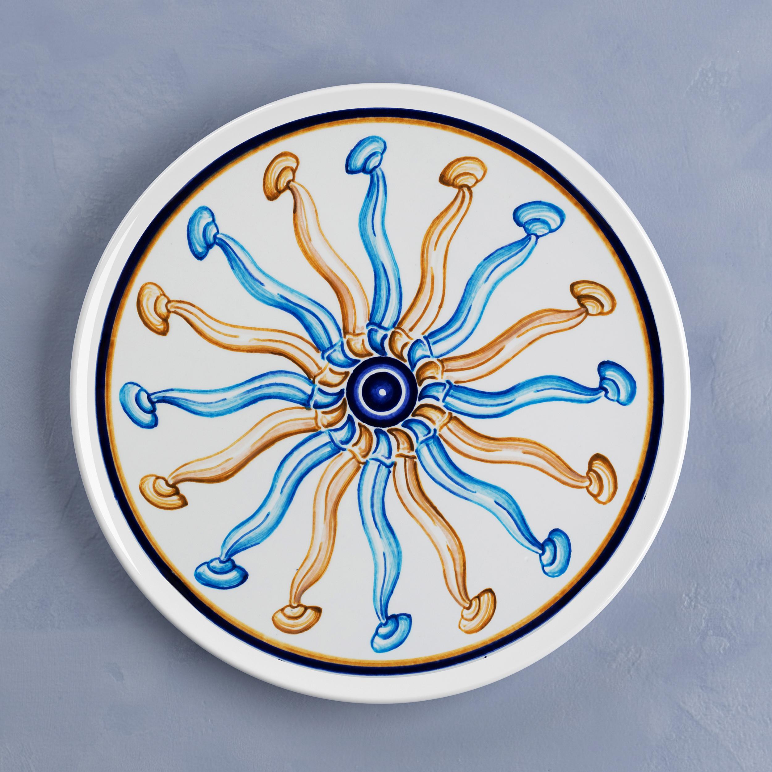 Beautiful handcrafted dinner plate by Crisodora will make an elegant statement with sophisticated Art de la table for every occasion.

Sicilian clay, hand painted.

Made in Sicily (Italy) by Master Artisans.