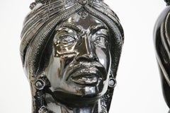 Coppia di teste moresche siciliane in pietra lavica lucida, edizione limitata