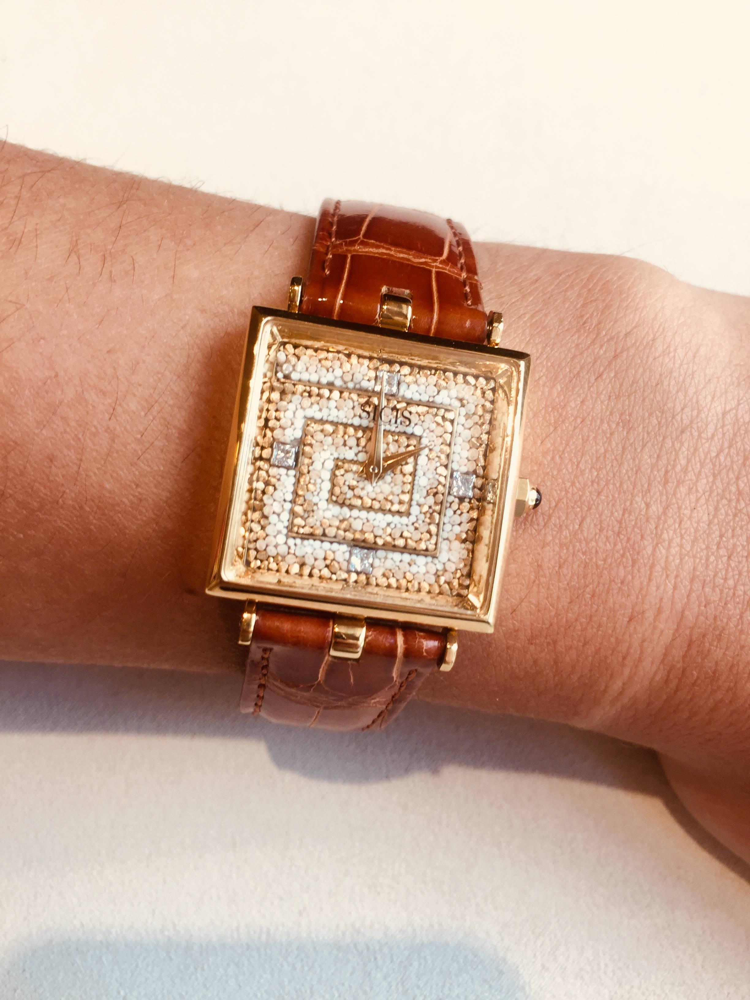 Micromosaic watch in yellow gold 18 kt and diamonds. Alligator strap. Swiss quartz movement. Limited edition of 10 pieces.

- Micromosaic
- Yellow Gold 18 kt 38,67 g
- Diamonds 0,23 ct
- Sapphire Glass
- Quartz Movement
- Swiss Made



For any