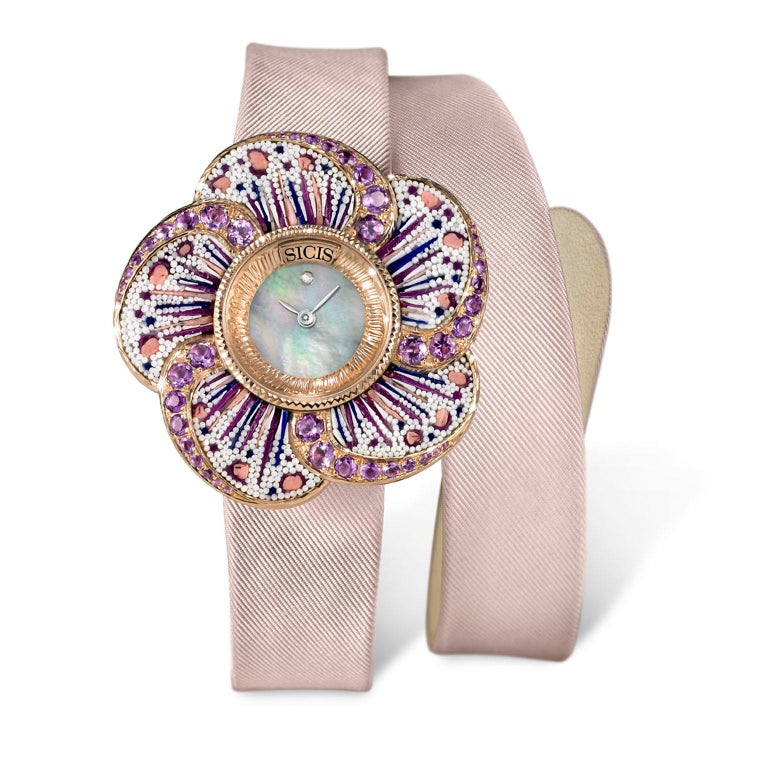 Micromosaic watch in yellow gold 18 kt and amethysts. Satin strap. Swiss quartz movement. Limited edition of 10 pieces.

Gold Case with mother of pearl
Nano­Mosaic ­ 
Sapphire Glass ­ 
Amethysts
White Diamonds 


For any questions please feel free