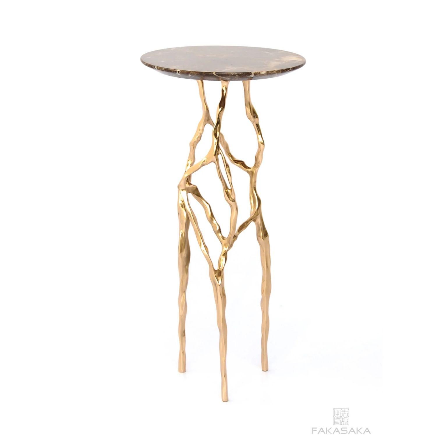 Sid drink table with Marrom Imperial Marble top by Fakasaka Design
Dimensions: W 30 cm, D 30 cm, H 61 cm.
Materials: polished bronze base, Marrom Imperial marble top.
 
Also available in different table top materials:
Nero Marquina Marble