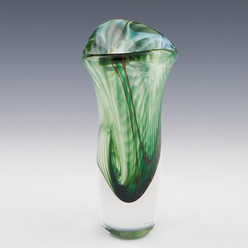 Siddy Langley grey, green and red freeform 'Demo' vase - 2009
Date : 2009
Origin : Devon, England
Bowl Features : ovoid in section with extend lobes to the open rim; clear 'sommerso' style base section
Marks : signed to base 'Siddy Langley