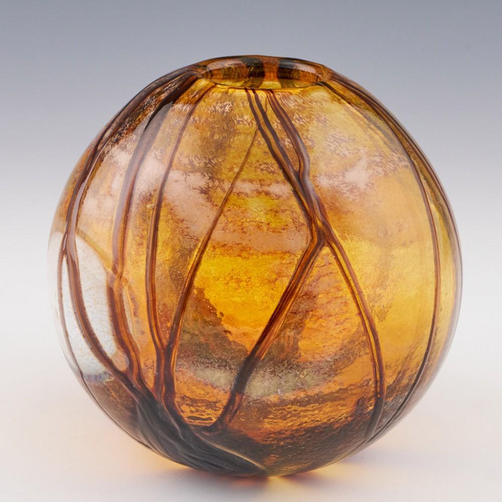 A Siddy Langley 'Supermoon' Round vase - 2022 made in Devon, England.
The bowl features a full moon seen through leafless trees with iridescent wisps of cloud or mist over brown/orange grounds; very reminiscent of those striking mornings when the