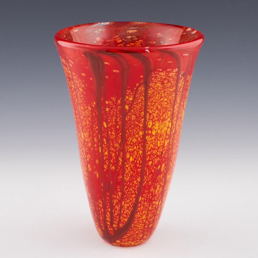 Siddy Langley tall open 'Maple Forest' vase made in 2022 in Devon, England. The bowl features North American seasonal 'fall' colours - orange and gold with trees.

Weight : 2212 grams

Siddy Langley is one of the premier glass artists working in