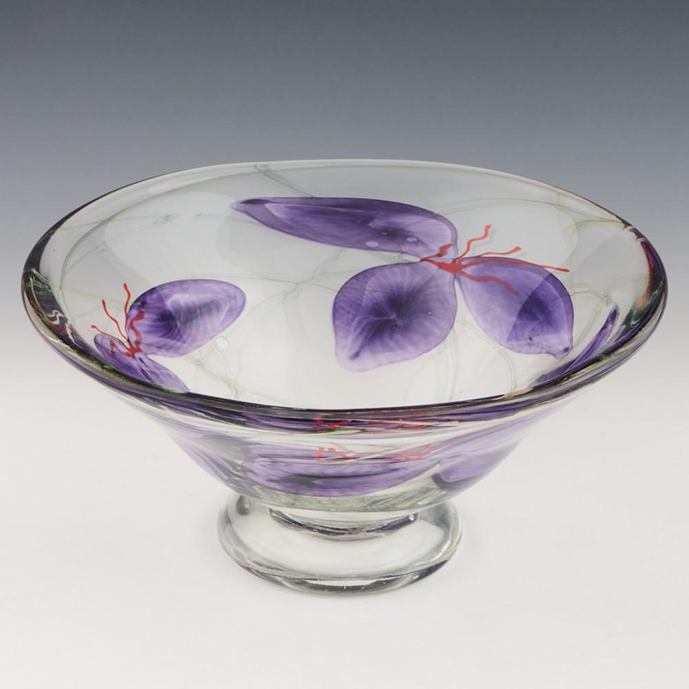 Heading : Siddy Langley Tradescantia footed bowl
Date : c2012
Origin : Devon, England
Bowl Features : Lilac, red, and greenglass depicting Tradescantia (spiderwart) cased in clear.
Marks : Signed Siddy Langley
Type : Lead
Size : 12.6cm height, 26cm