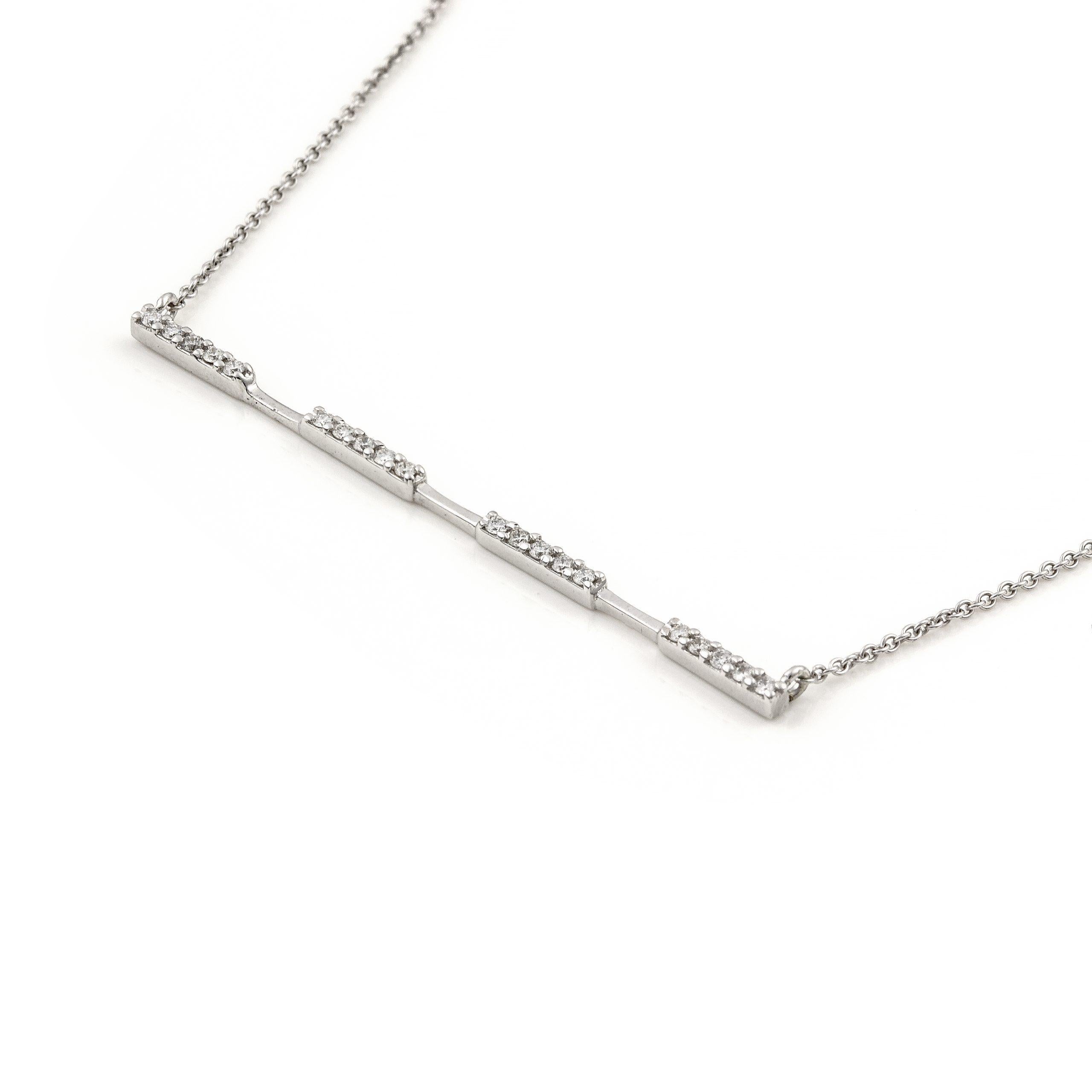 Recycled 14K White Gold

Diamonds Approx. 0.2 ct

Bar Length: 5 cm/ 1.96 inches

Side Bar Pendant in White Gold and Diamonds.

This collection combines the simplicity of the single piece with the opulence of diamonds.

All jewels in the Essentials –