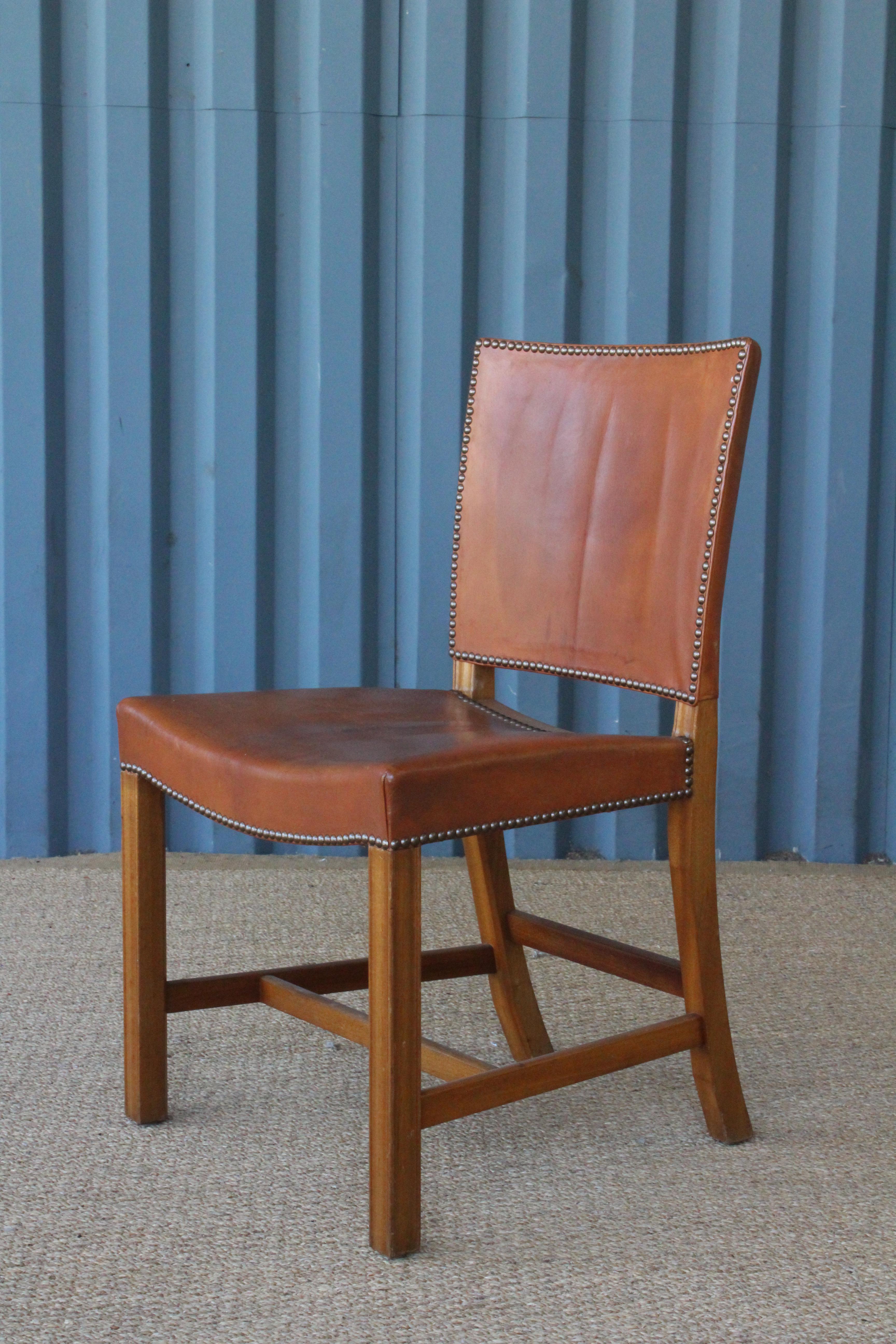 Single side chair by Kaare Klint, Denmark, 1950s. Nailhead detailing with original leather with heavy patina. In good original condition.