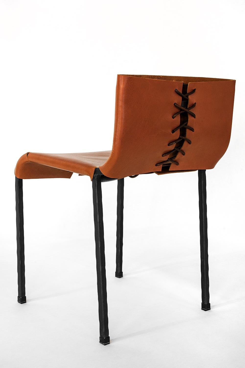 CHAIR NO. 1 
J.M. Szymanski
d. 2018

Inspired by a Spanish toreador, this sleek combination of blackened steel and thick bull leather. Can be modified to any seat height. 

Custom sizes available. Made in the Bronx, New York, USA.

Our products are