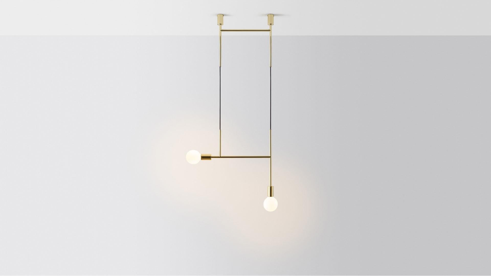 Side kick pendant light by Volker Haug.
Dimensions: D 2 x W 63.2 x H 108 cm. 
Material: Brass. 
Finish: Polished, Aged, Brushed, Bronzed, Blackened, or Plated
Cord: Fabric or metal
Light: Opal G95 LED (E26/E27 110 - 240V, 12V version