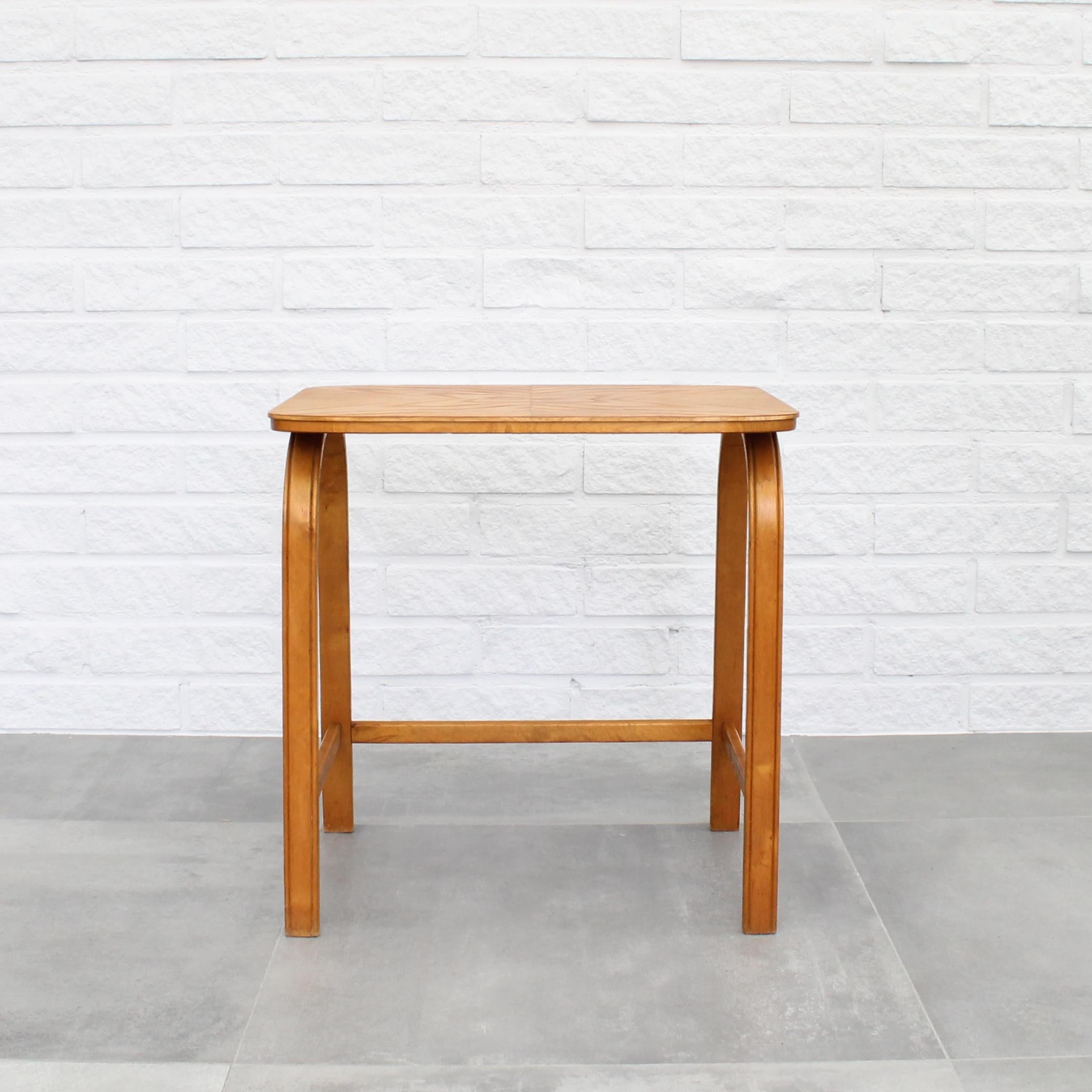 Side table 741 designed by the Swedish architect Axel Larsson for the manufacturer Svenska Möbelfabrikerna in Bodafors. Features elm veneer with bentwood legs in birch. Produced in the 1940’s. Swedish designer Axel Larsson joined Svenska