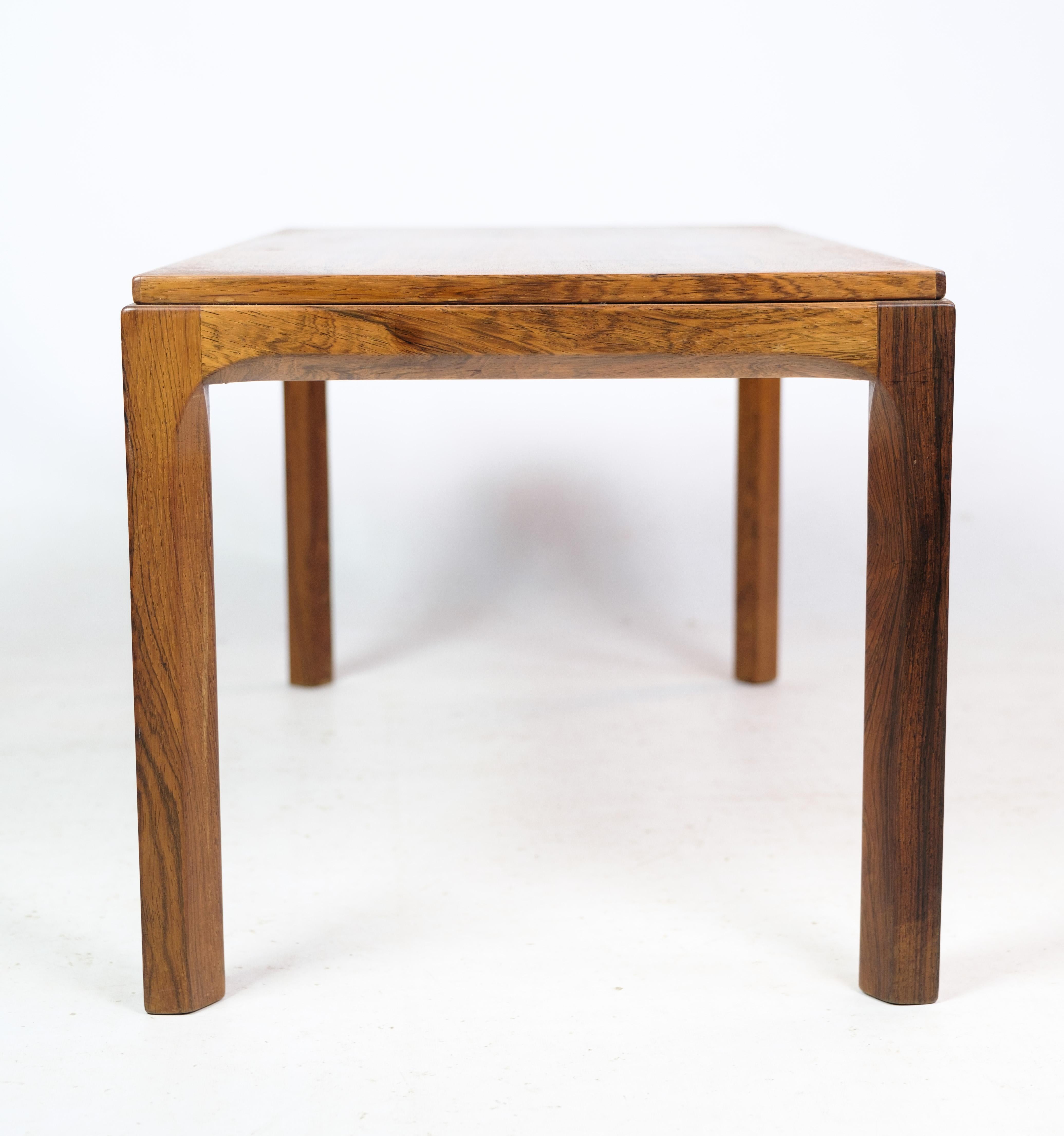 Side table, designed by Aksel Kjersgaard in the wood type rosewood for Odder Møbler. Model number 381. In very good condition. Aksel Kjersgaard is known for his detail for craftsmanship. He mostly worked with teak and rosewood.

This product will be