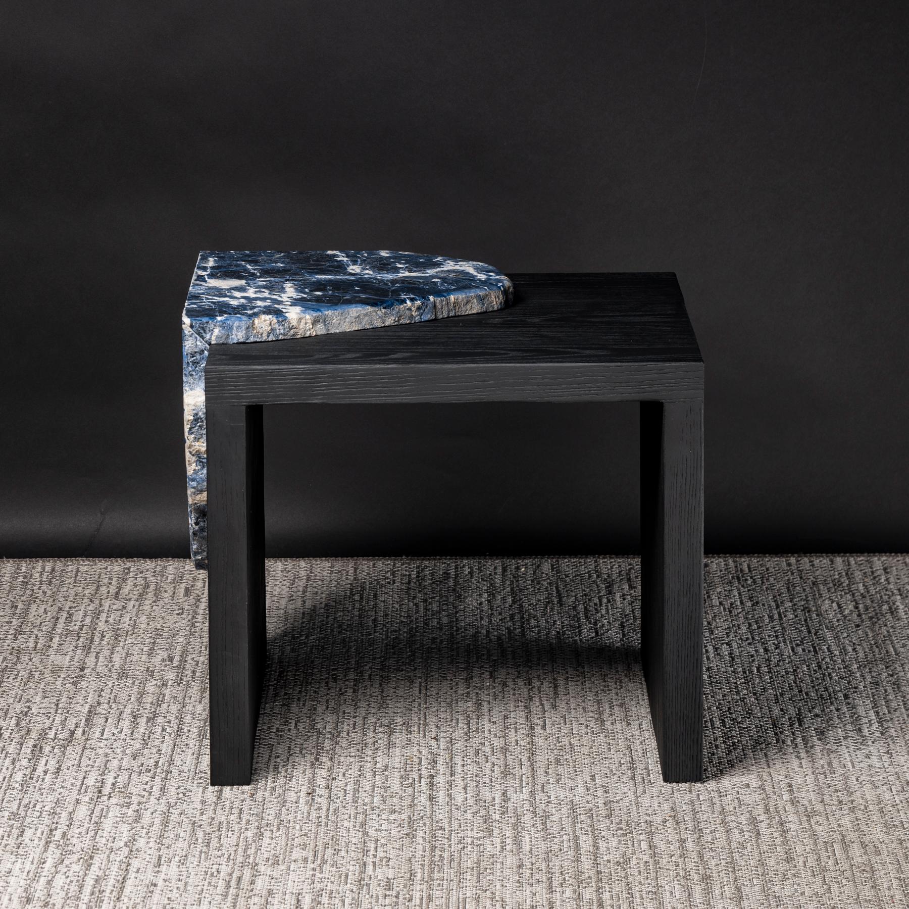 Side table with American solid ash wood grey color with a laser cut Brazilian Sodalite slab on top.

Back to normal collection

This collection features American ash wood, as a simulation of human development (buildings, cities, etc); with the