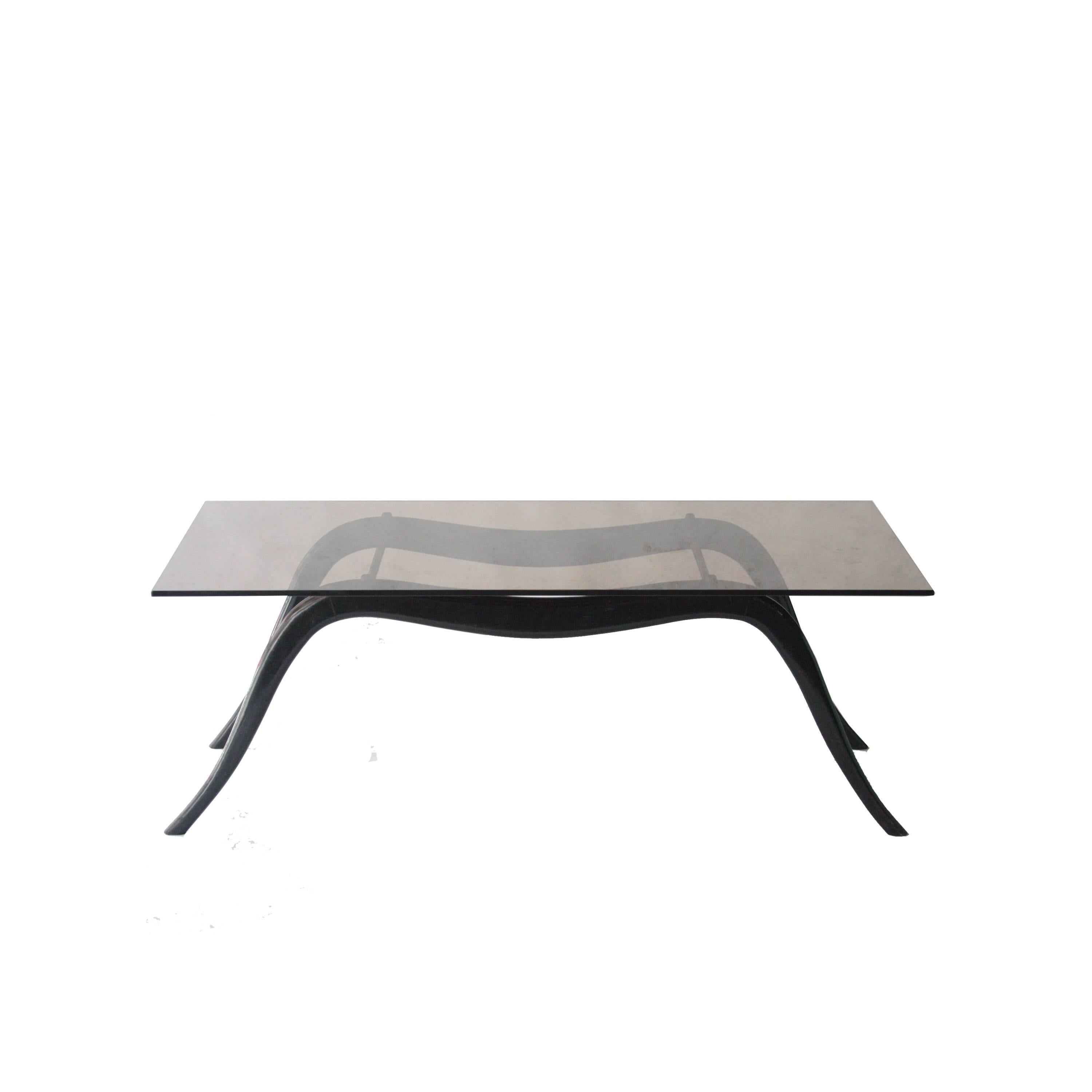Centre table attributed to Ico Parisi with structure made of solid black lacquered wood, brass and black smoked glass top.