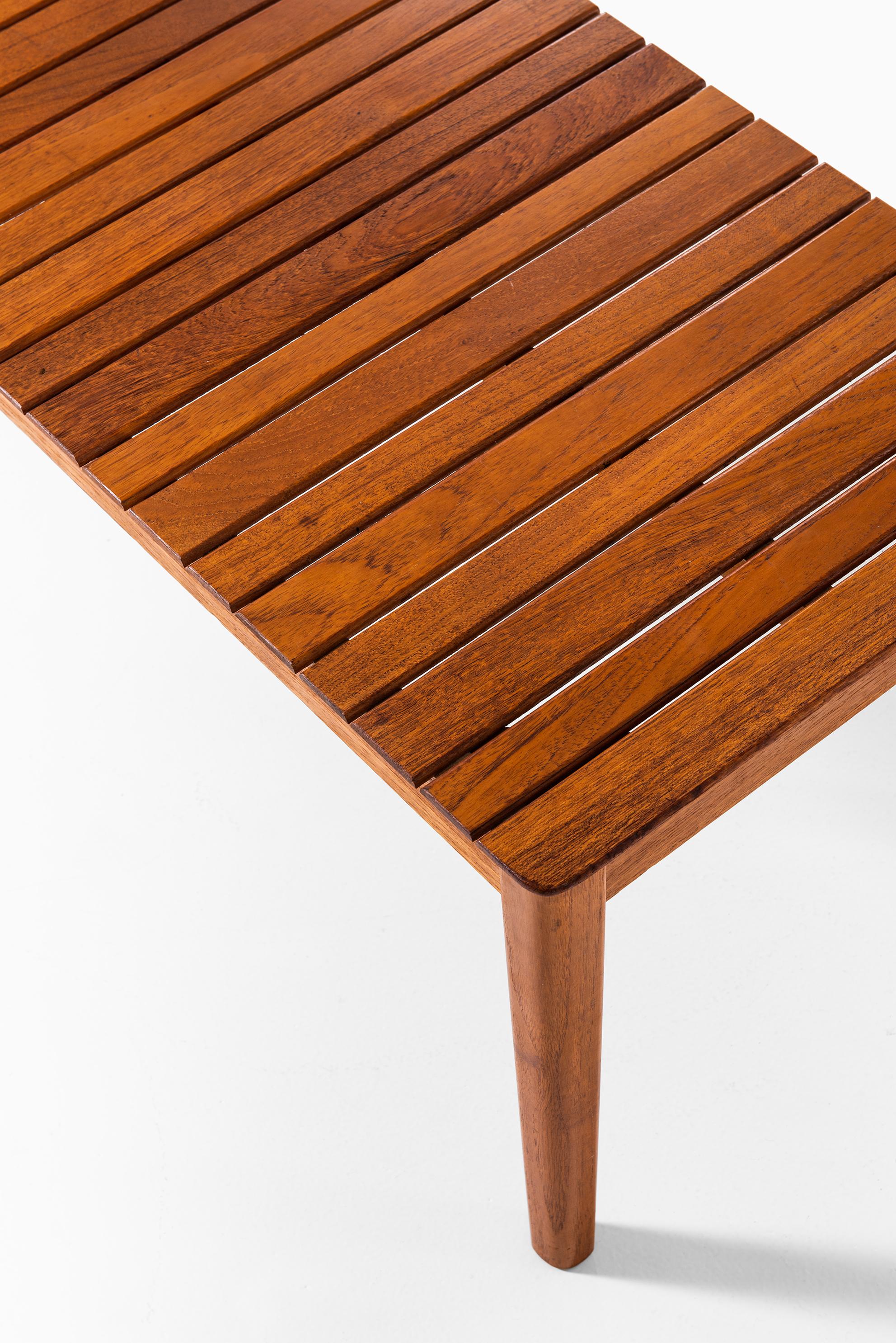Rare side table or bench in solid teak. Produced by Alberts in Tibro, Sweden.