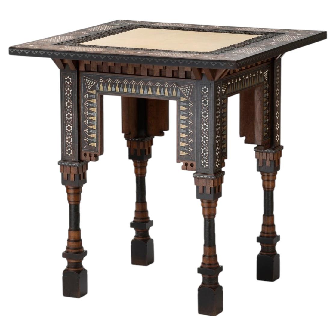 Side table by Carlo Bugatti, made of inlaid wood and parchment, circa 1900