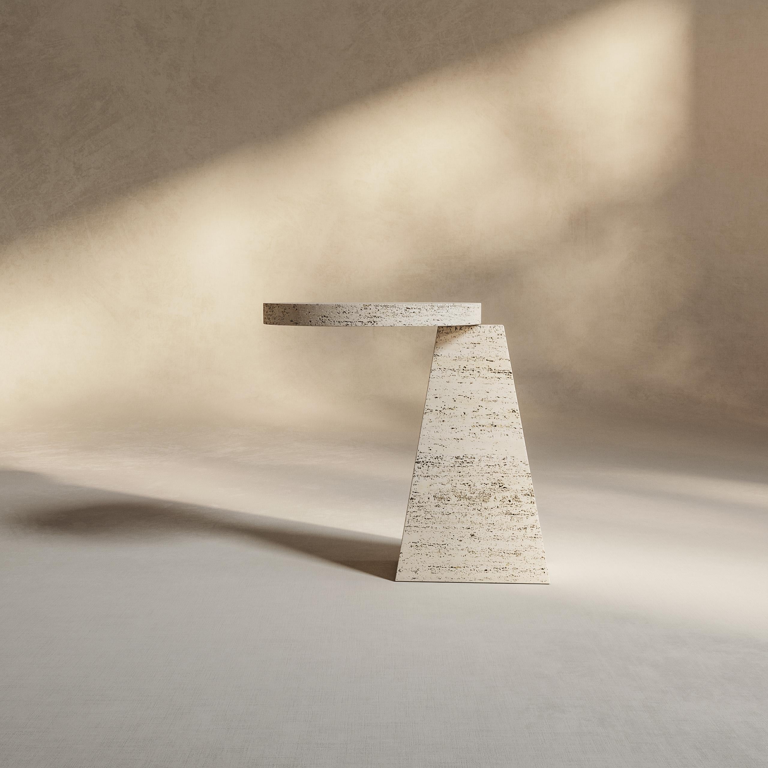 Table d'appoint Dam Atelier
Dimensions : D 40 x H 50 cm
Matériaux : Pierre en travertin. 

dAM atelier est un duo de jeunes architectes italiens partageant la même passion pour le design et l'architecture, Paolo d'Alessandro et Marco Malgarini.
Les