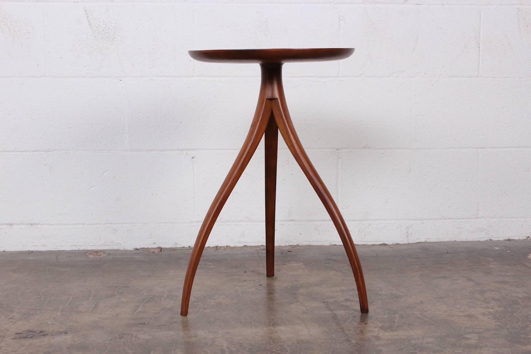 A walnut side table designed by Edward Wormley for Dunbar.