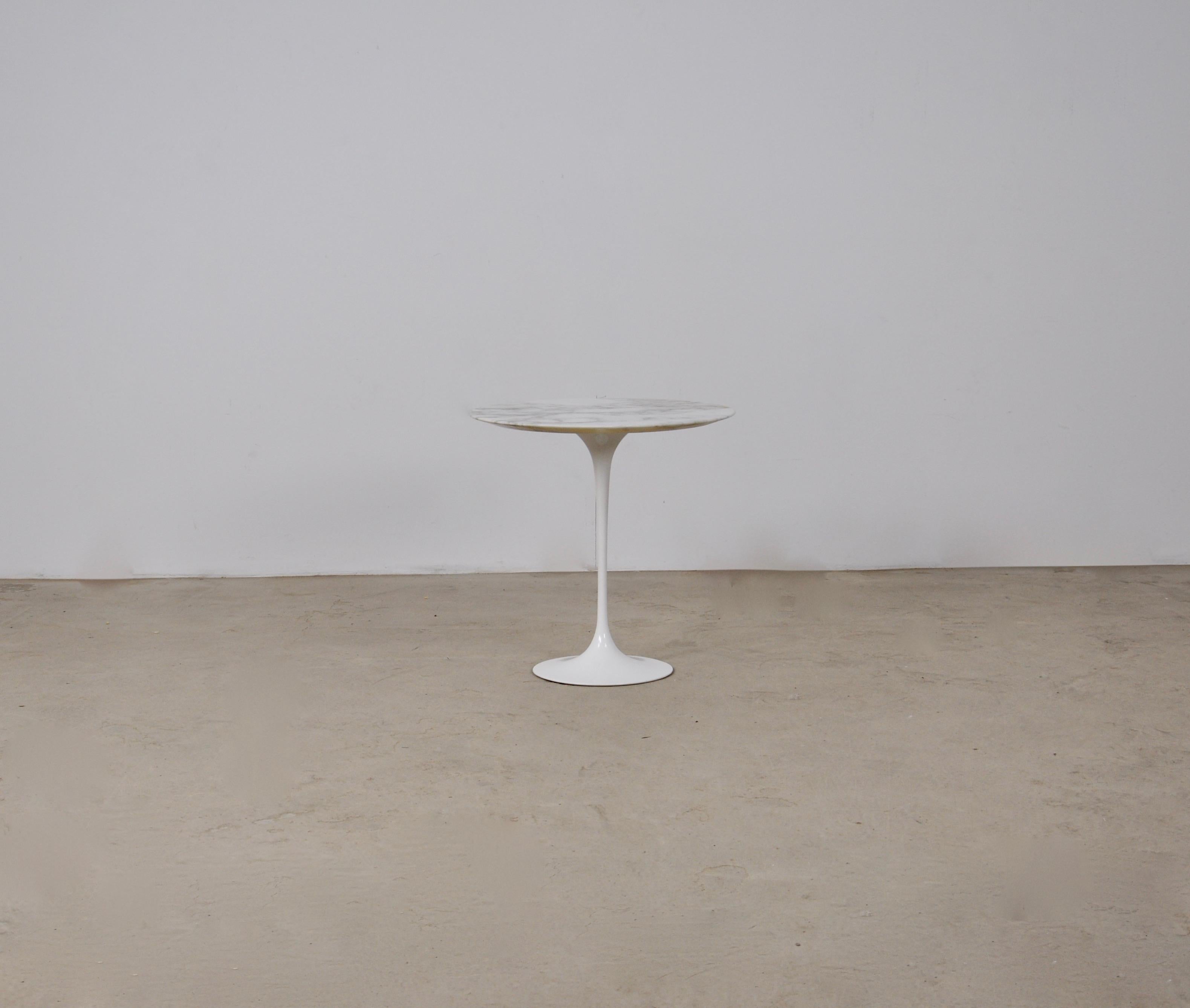 Marble and metal side table by eero saarinen. Wear due to time and age of the table.