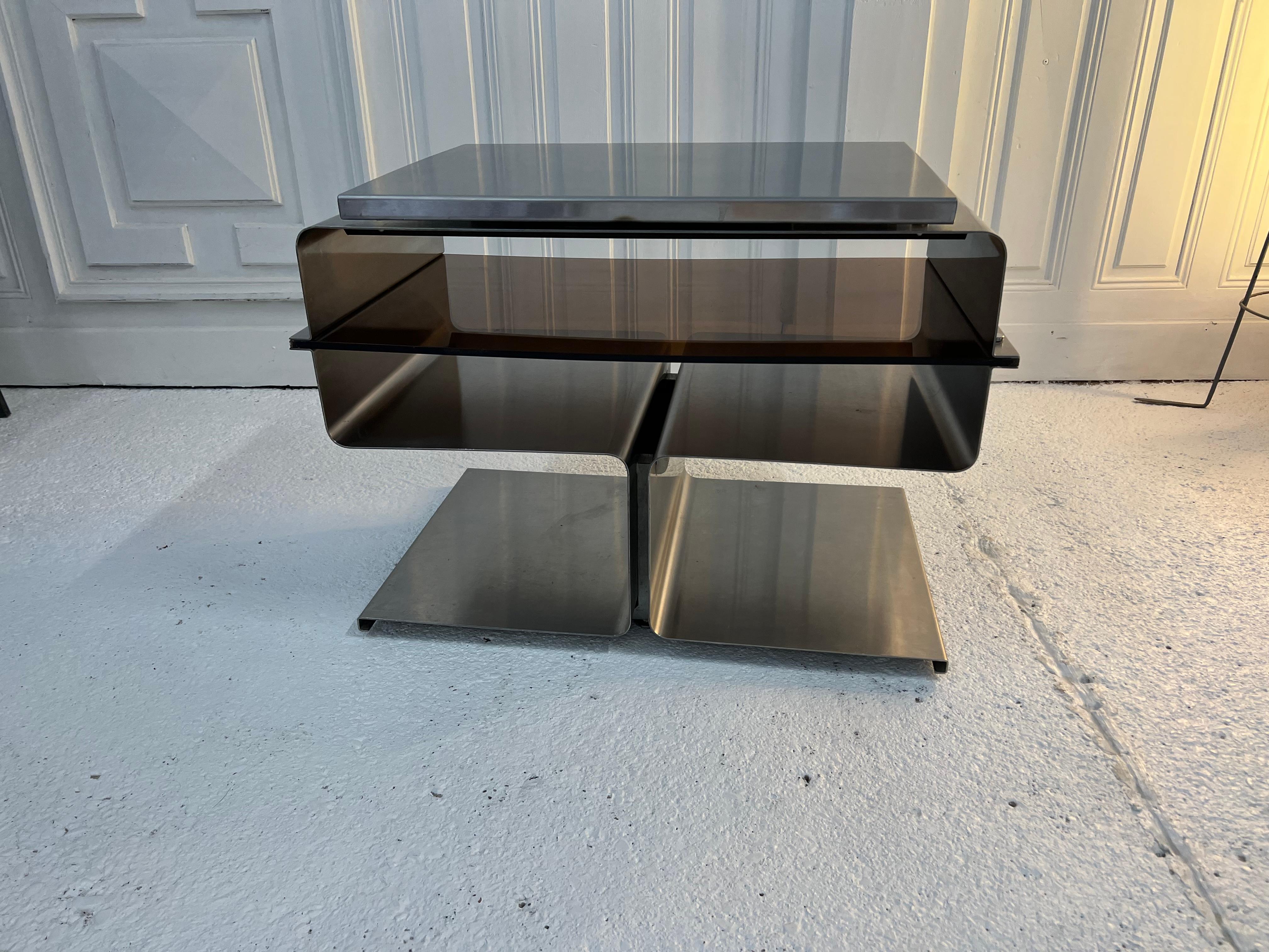 Nice coffee table by Francois Monnet édition Kappa France 
the first use was planned for a Hifi or tv chain

François Monnet is a French architect and designer. From 1968, he designed collections of steel furniture for Kappa, which have become