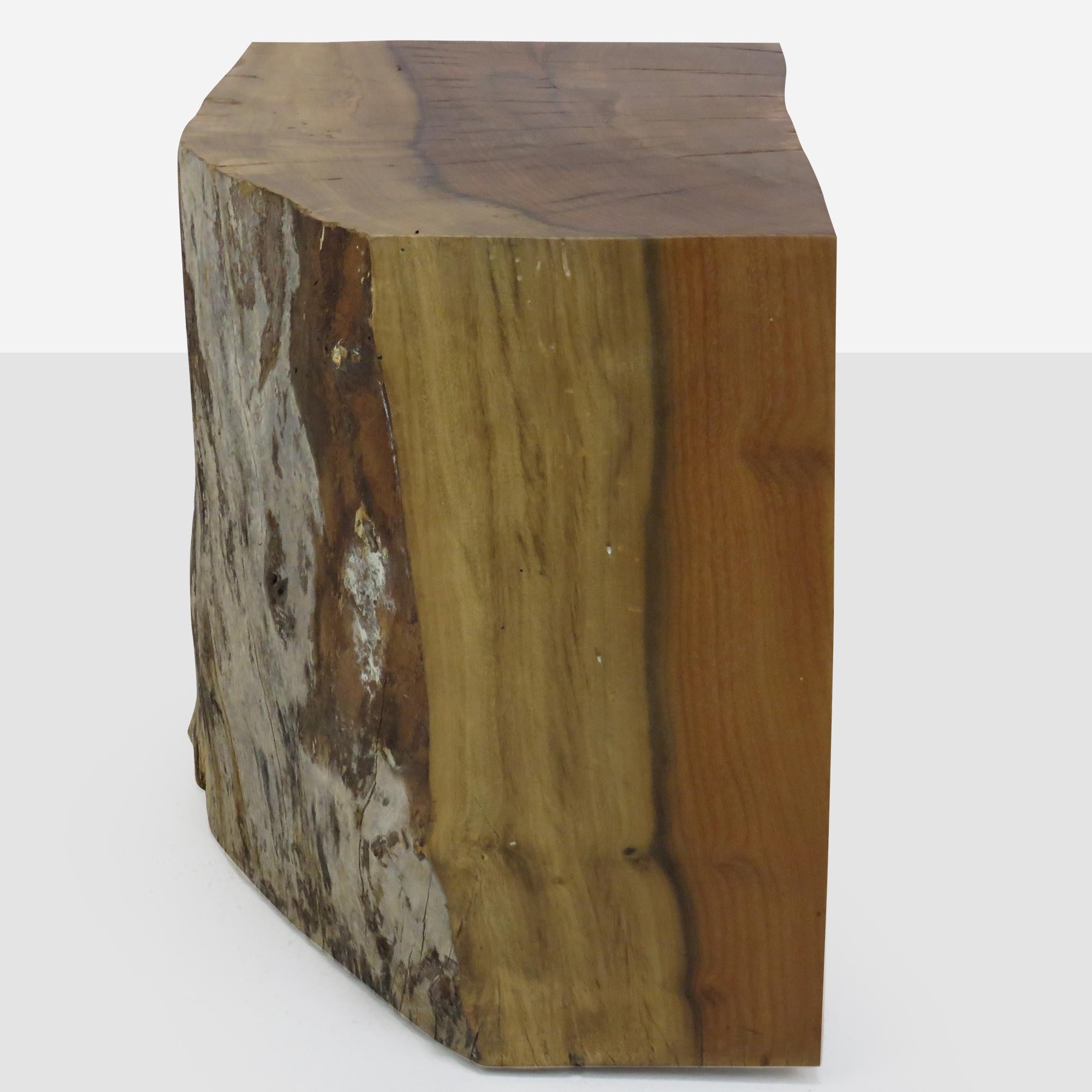 A unique side table of bay laurel with natural lines and a live edge side. 