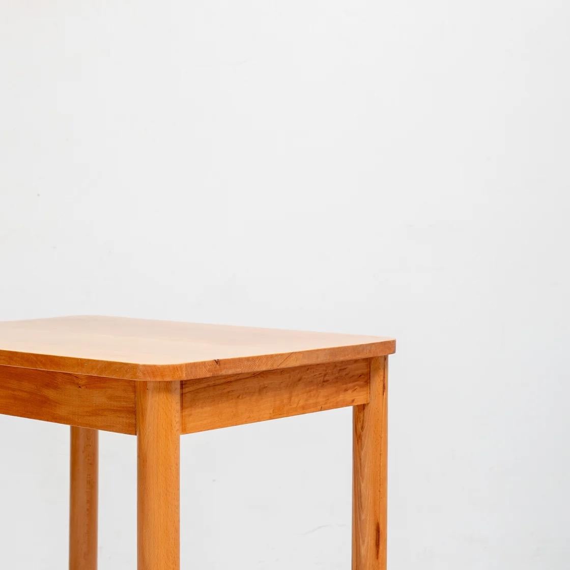 A compact wooden side table designed with the refined simplicity characteristic of Gautier-Delaye’s work. Crafted in solid wood with clear proportions and warm tone, it brings a quiet, natural presence to any interior — perfect as a bedside,