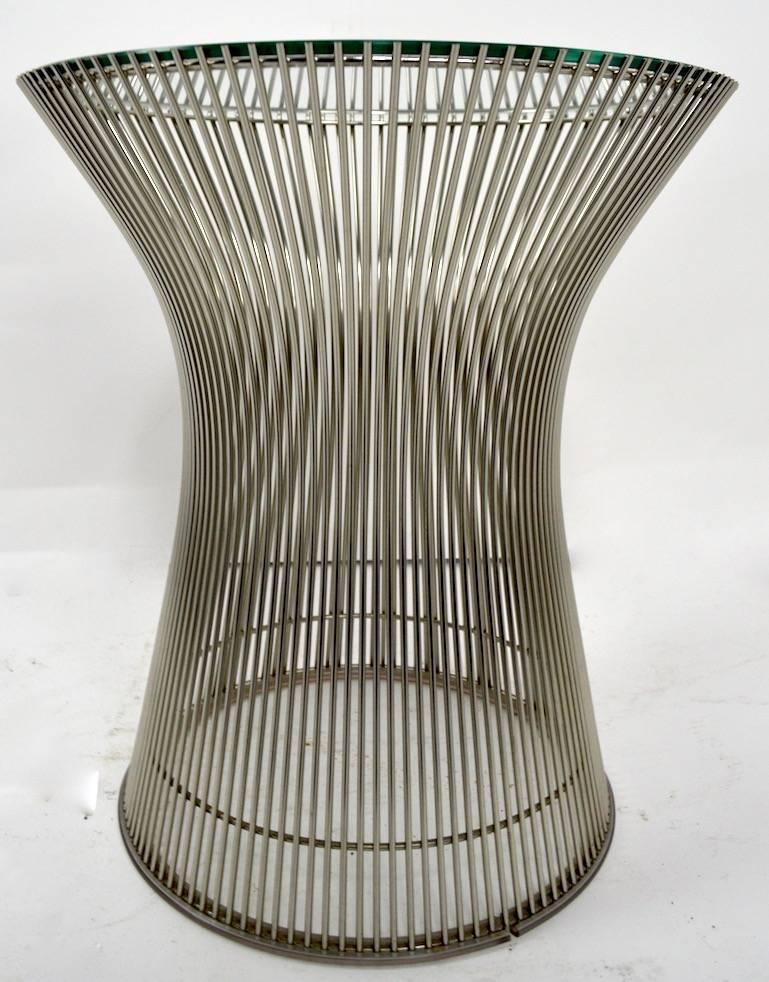 Classic waisted form chrome rod side table designed by Warren Platner for Knoll. Nickel plate metal with original plate glass insert top. This example is in excellent original condition, clean and ready to use.