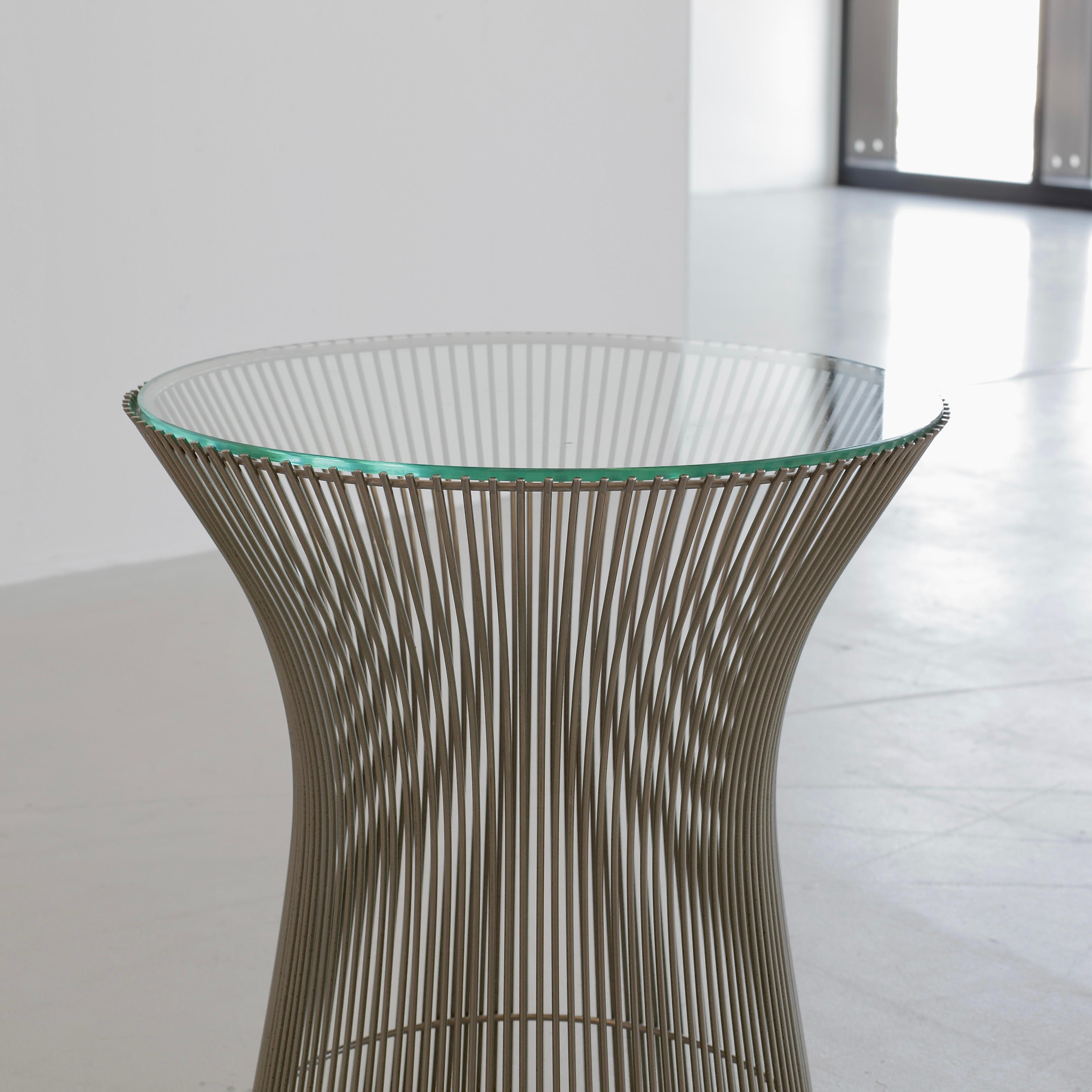 Side-table designed by Warren Platner. U.S.A., Knoll International, 1966.

Side-table with welded steel rods on the circular frame with round glass top insert. An iconic piece, table and sculpture in one!