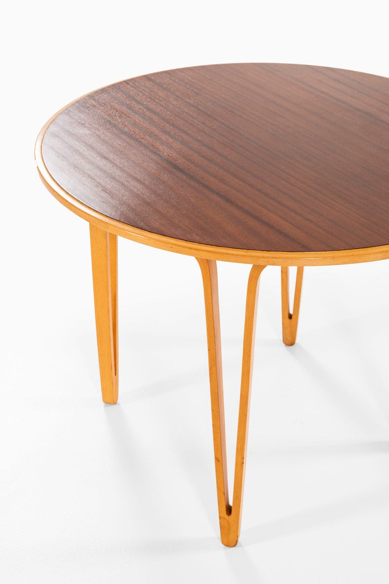 Rare side table / coffee table attributed to Carl-Axel Acking. Produced in Sweden.