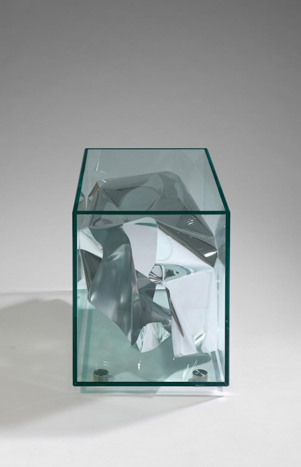 Fredrikson Stallard, UK Designers, side table 'Crush', 2012, Limited Edition of 20 + 2P + 2AP. Water polished aluminum sheet is hand formed by the artists and enclosed in a glass box. The table reflects its surroundings in an abstract, chameleon