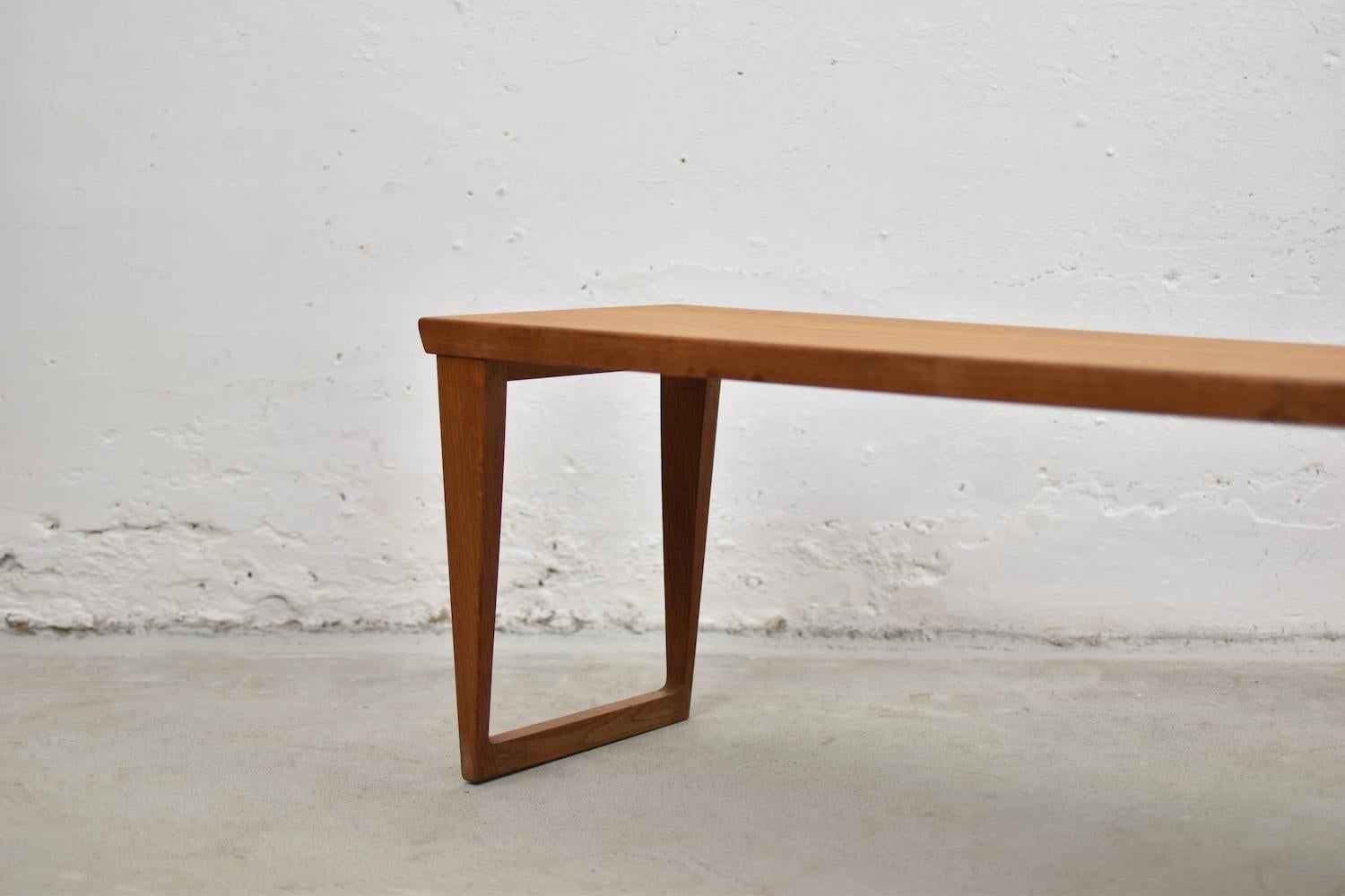 Lovely Minimalist low bench or side table designed by Kai Kristiansen for Aksel Kjersgaard, Denmark 1960s. This is Model No. 36 and is made out of oak. Very elegant and modern in any interior. Clean lines, perfect size. Professionally restored.