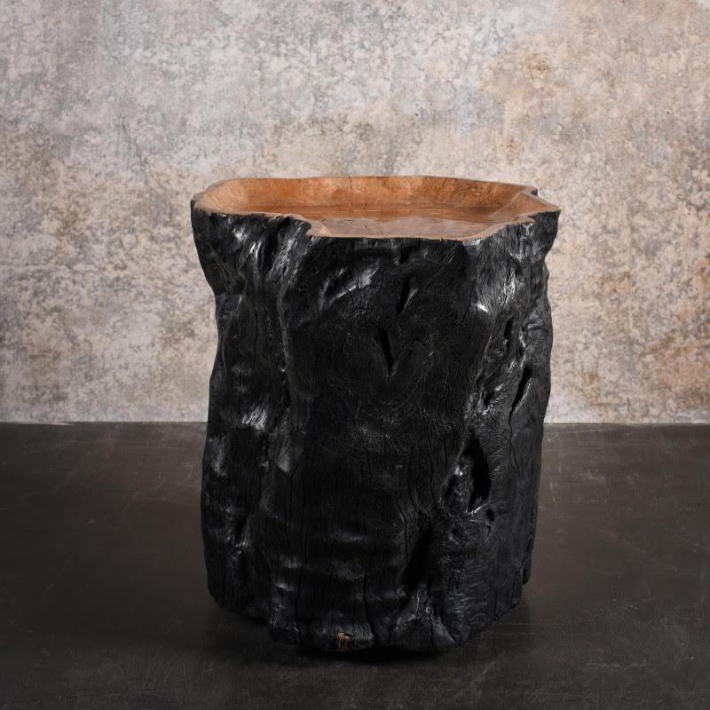 Side table, end of sofa with castors, blackened wood, carved in a tree trunk, XXth century.

Side table, end of sofa with castors carved from a tree trunk, blackened wood, 20th century.
H: 53cm, W: 45cm, D: 47cm