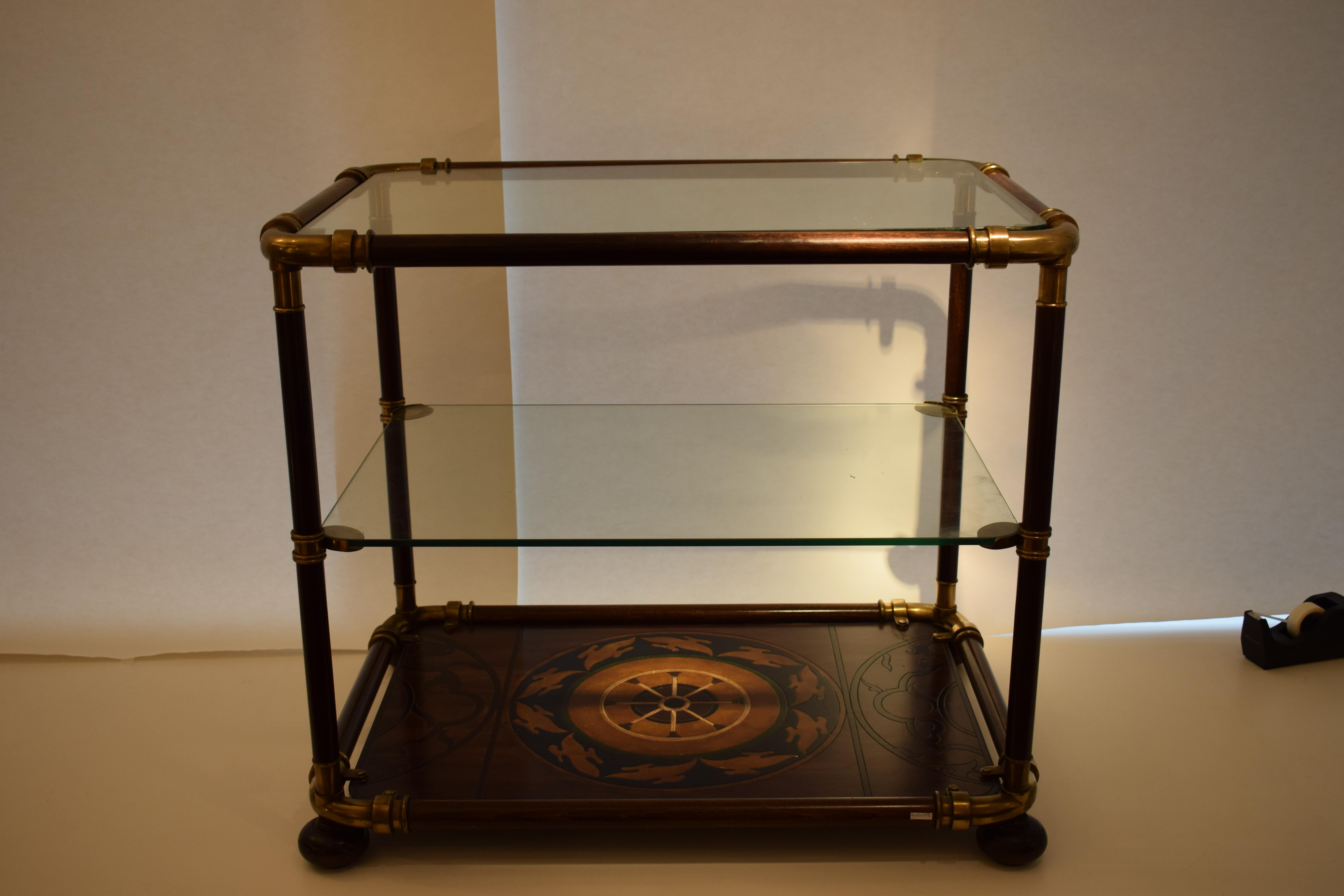 Side table in brass and mahogany by Pierre Lottier.