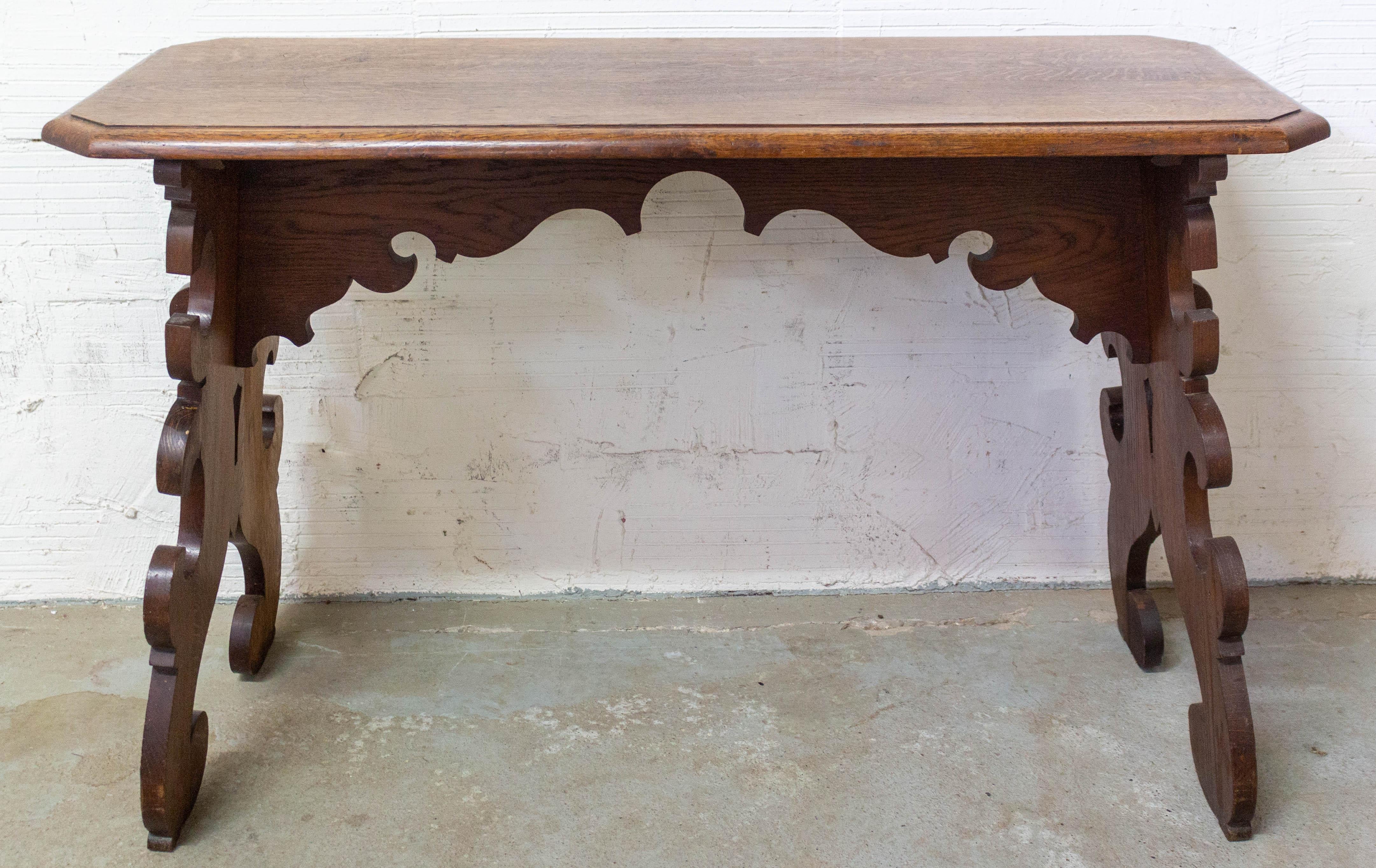 Spanish hall side or console table
Handsome and practical
Spanish Colonial revival, circa 1960-1970
Wrought iron and carved cherrywood
Good condition with signs of use to the top all usual for a piece of this age.


 