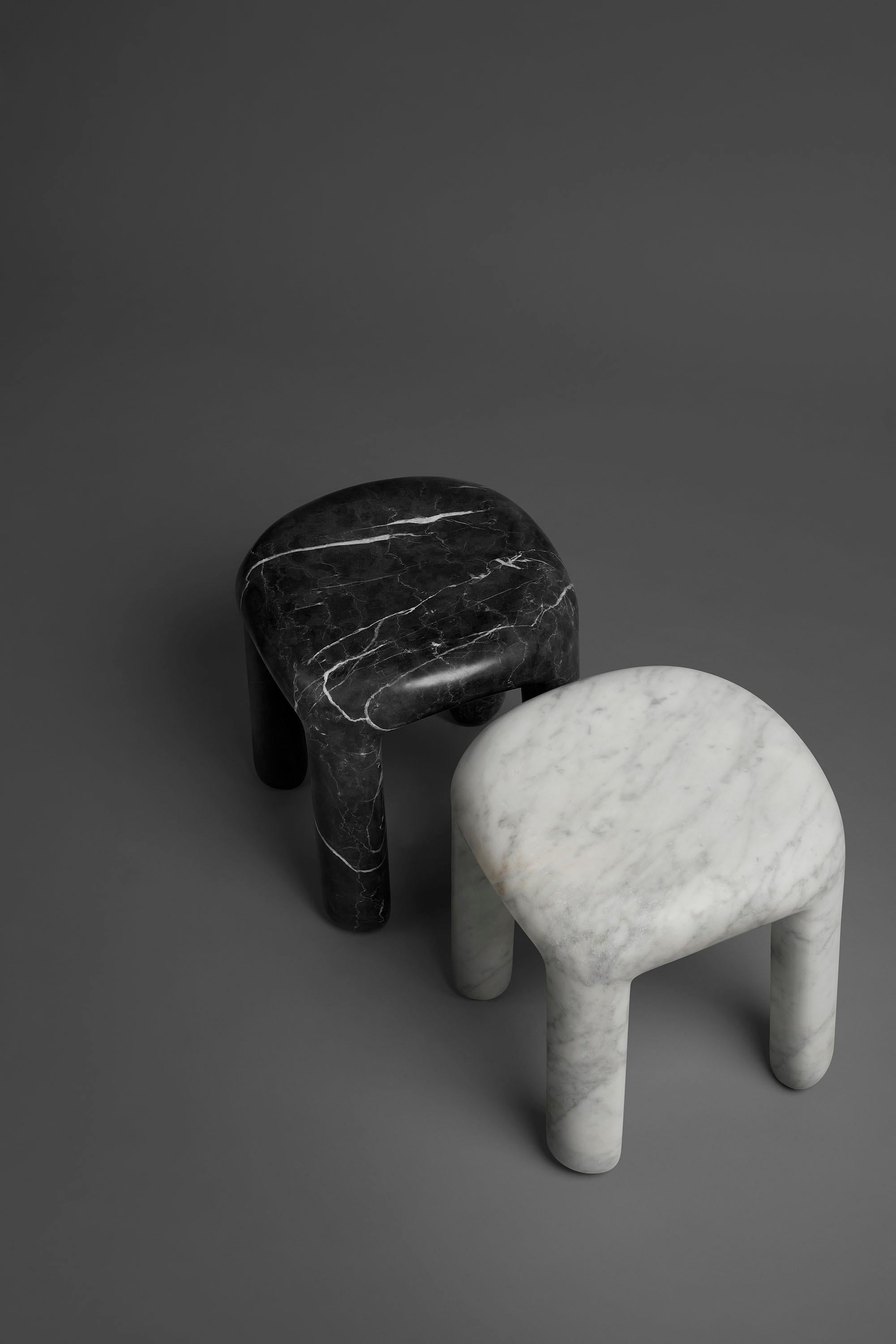 Carved Side Table in Carrara marble, Bold low side table by Ming Design Studio For Sale