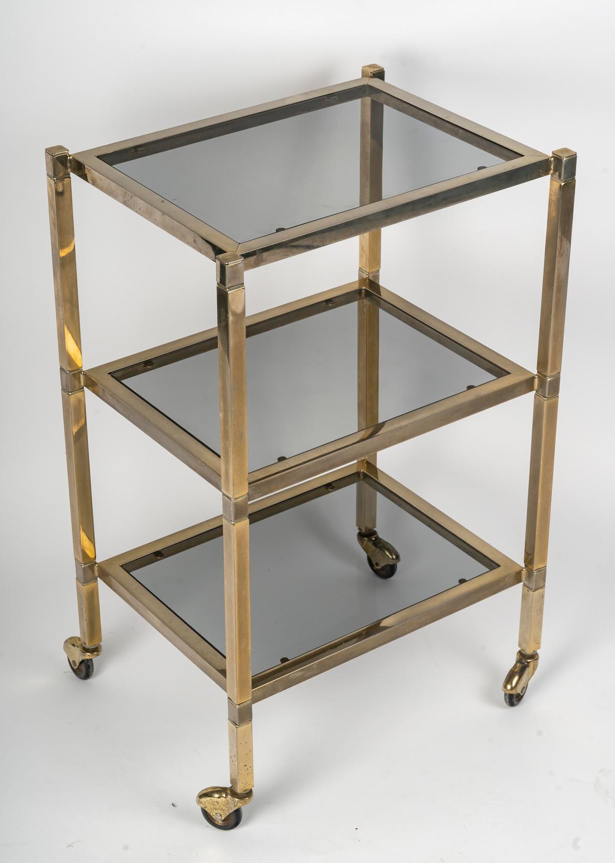 Side table in chromed steel, 1960-1970s design.

Side table 1960-1970 in chromed metal, glass, on castors, mid XXth century design.
h: 72cm, w: 44cm, d: 35cm