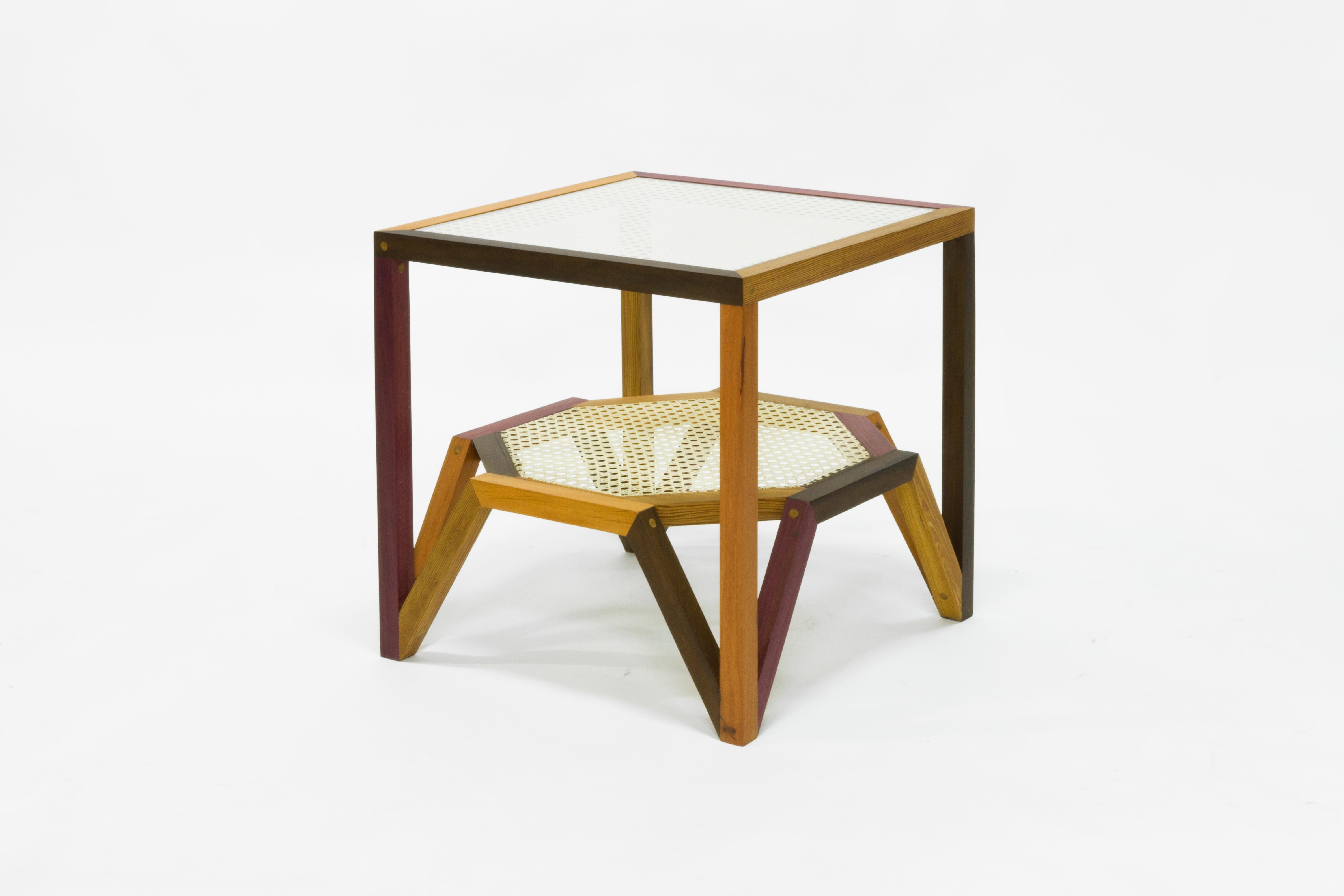 The side table was designed to simulate the moiré pattern, a visual effect that occurs when viewing a set of lines or dots that overlaps on another set of lines or dots, where the sets differ in size, angle, or spacing. In order to create this
